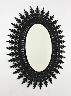 Large Sunburst Oval Mirror in Black Lacquered Iron