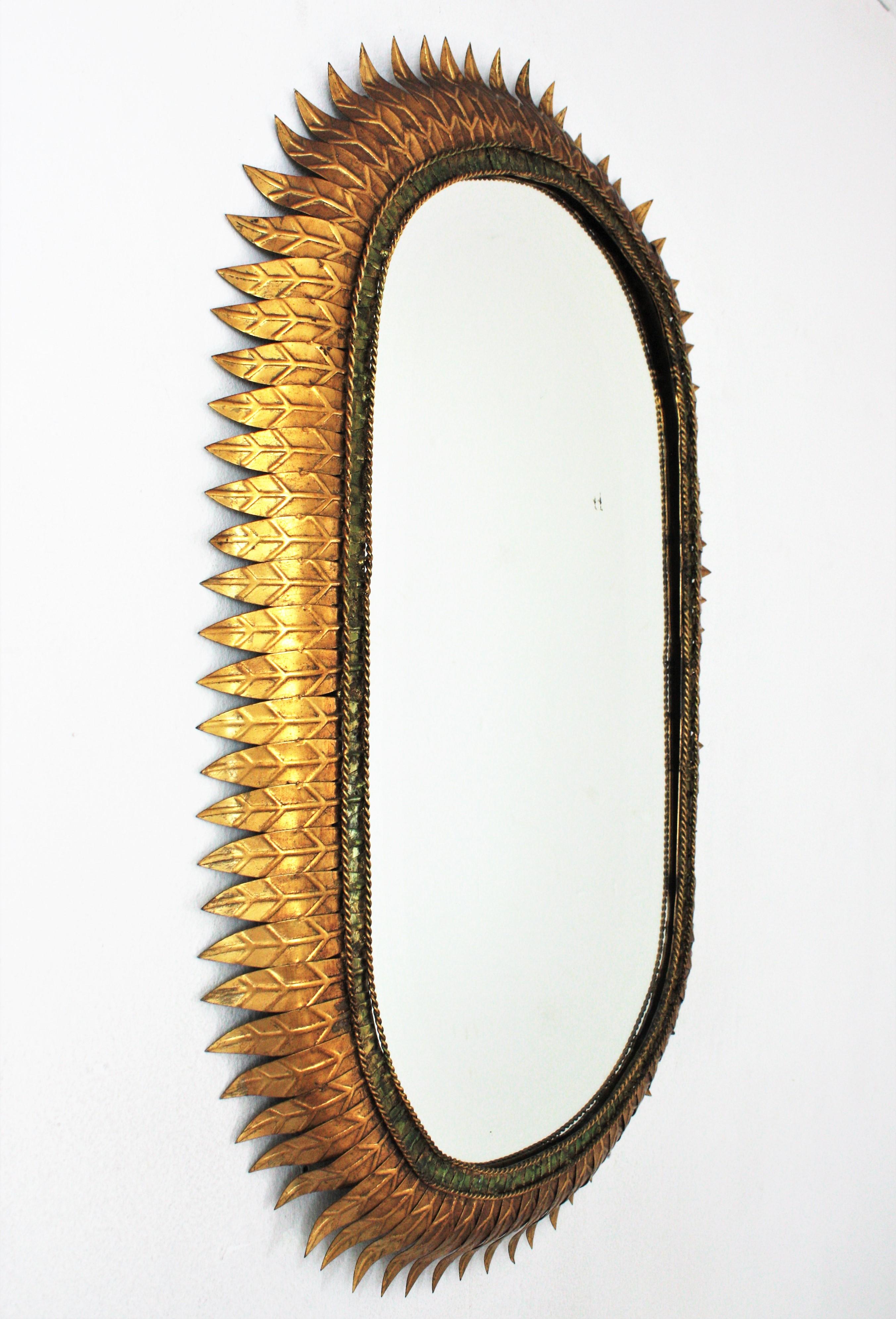 Large Sunburst Oval Mirror with Gilt Iron and Green Frame In Good Condition In Barcelona, ES