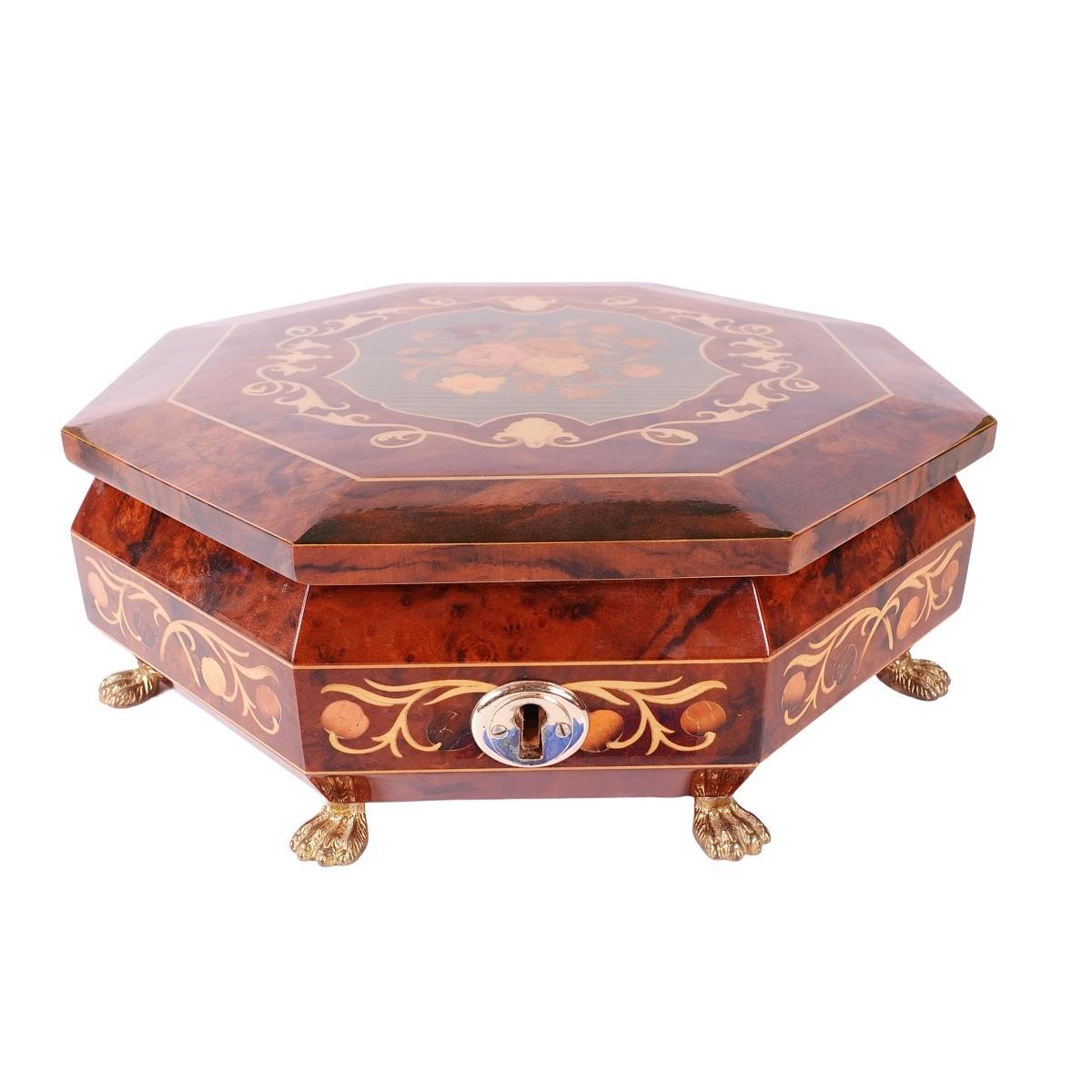 Offering this rare and vintage large Italian inlaid marquetry music box with gilded metal 