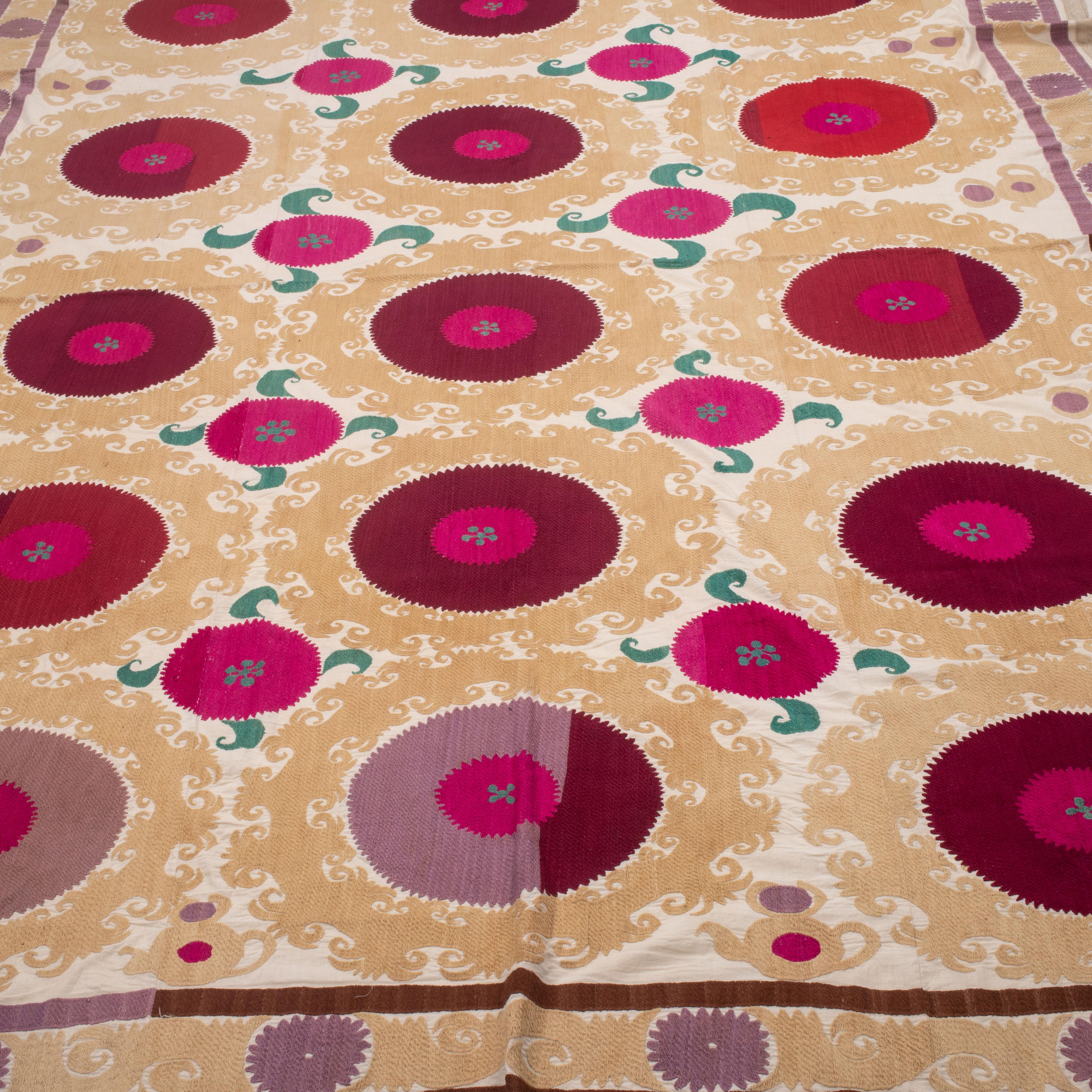 An unusual Uzbek suzani with a bold design. All cotton from 1960s / 70s.