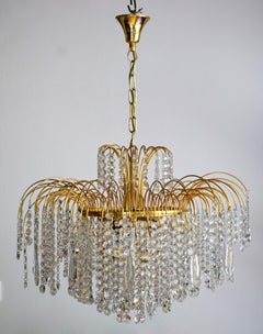 Large Swarovski Hollywood Regency crystal waterfall chandelier, 1980s