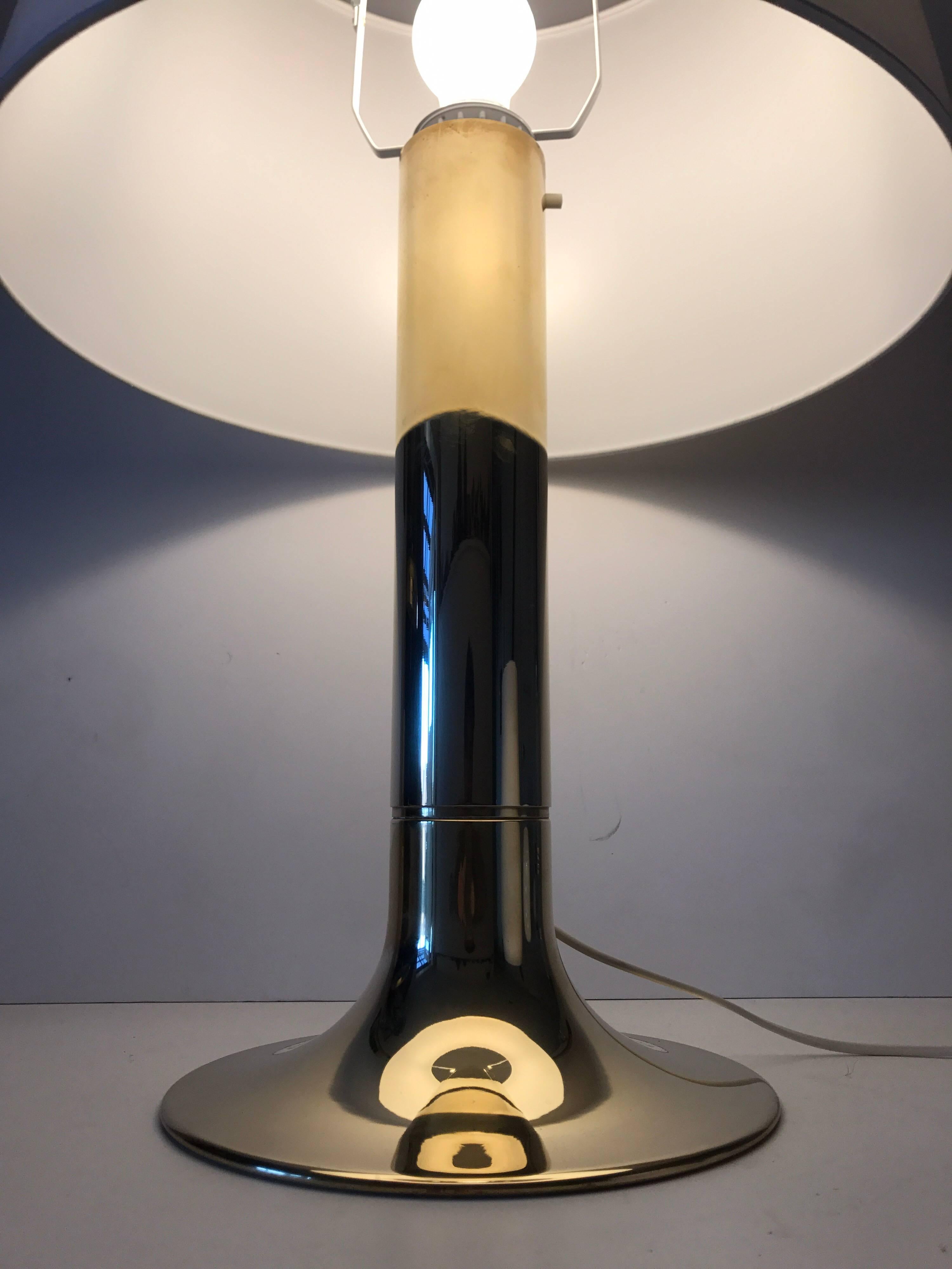 Large Swedish 1960 Hans Agne Jakobsson brass table lamp.
A very large and beautiful polished brass table lamp designed by the great Hans Agne Jakobsson. This lamp is in a very nice condition and it measures 63 cm with the shade and the base