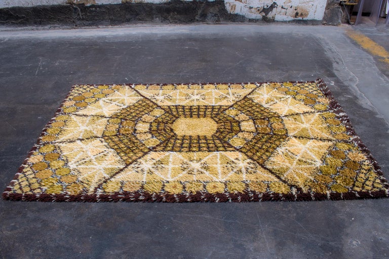 A warm-tone Rya rug by Swedish designer Marianne Richter in her 