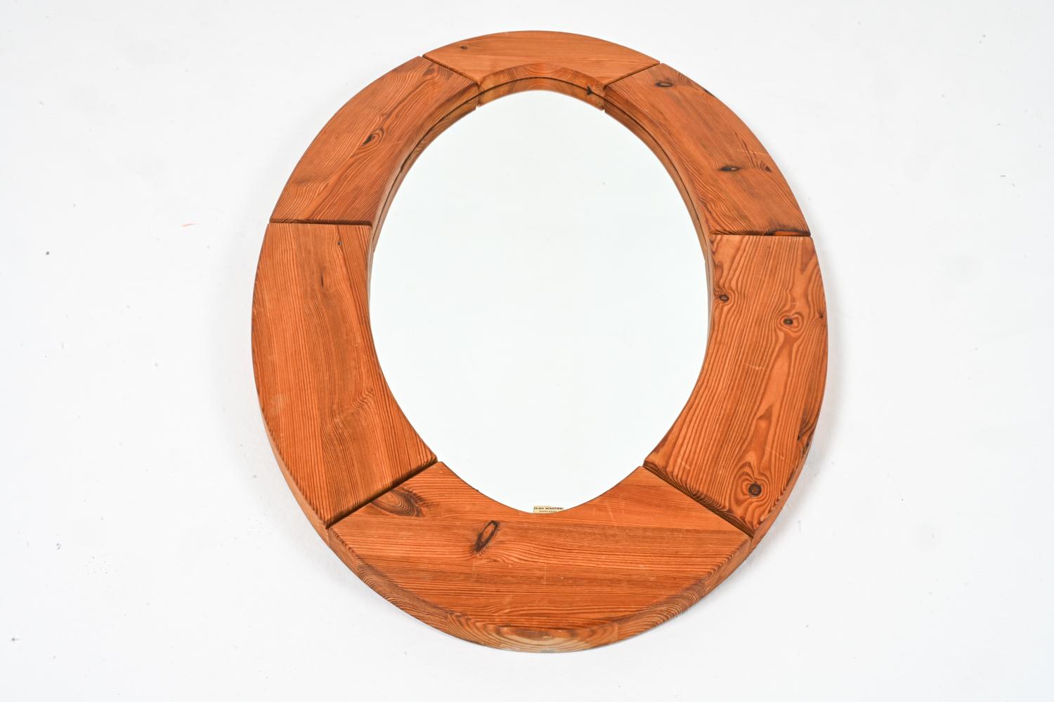Large Round wall mirror in solid pine by Glas Mäster Markaryd, Sweden, 1960. Embrace the beauty of nature with this vintage find. This intriguing wall mirror, crafted in Sweden during the 1960's, embodies the essence of Swedish organic modernism.