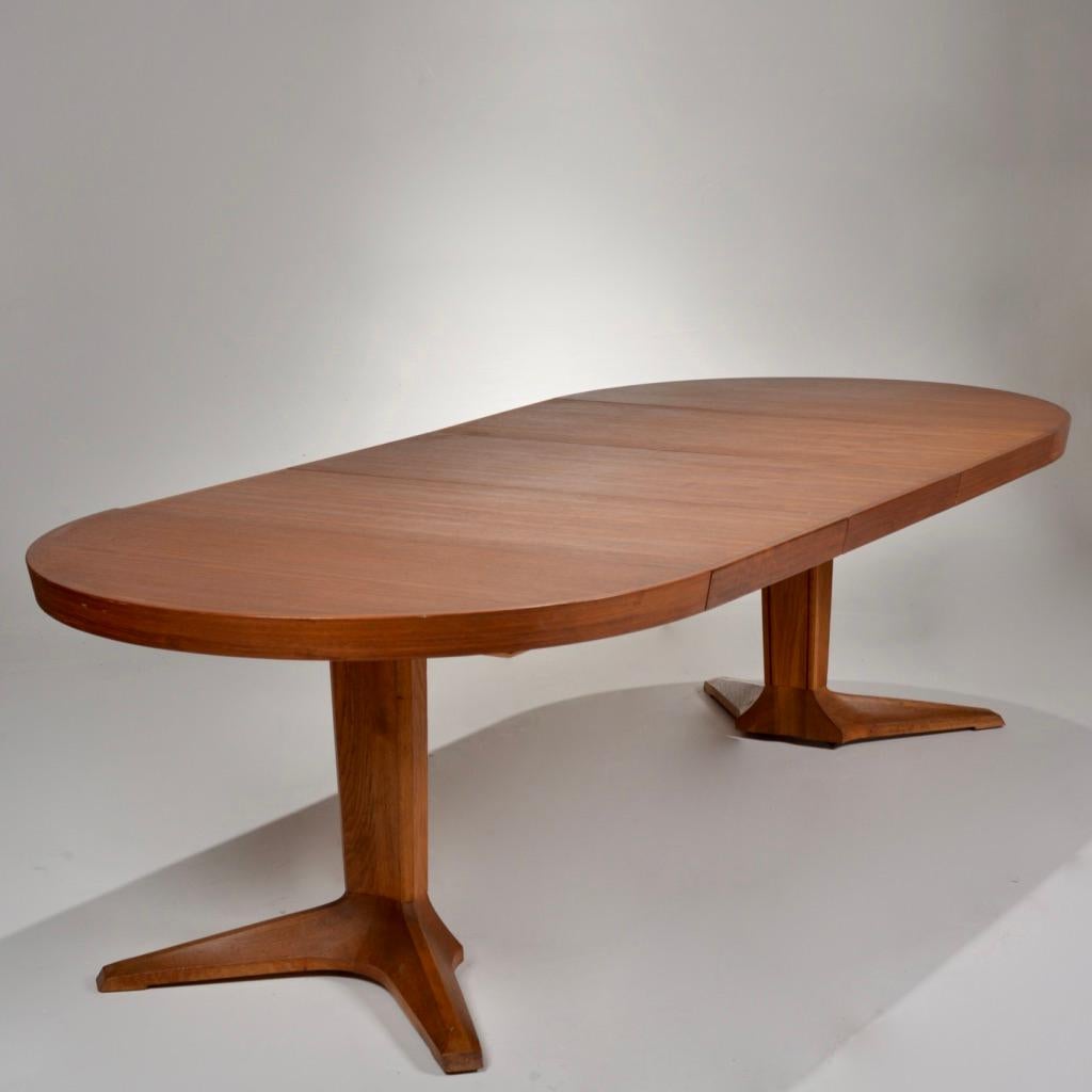 Mid-century extendable round dining table with three removable leaves from Sweden, Circa 1960.
  