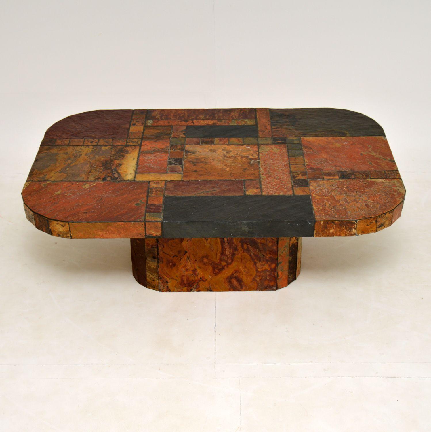 A large and impressive vintage stone coffee table, recently imported from Sweden. This dates from around the 1970-80’s.

It is of amazing quality and is extremely striking. We have never seen one like this before! It is made from a patch work of