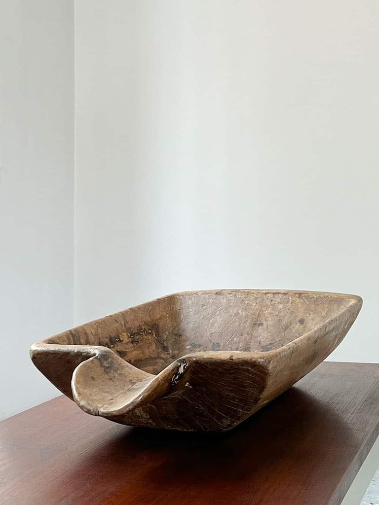 Rare and large Swedish wooden bowl or tray in a primitive and wabi sabi style, produced in Sweden during the late 1800s.

This rare and elegant wooden bowl or tray in a primitive and wabi sabi style was produced in Sweden during the late 1800s.