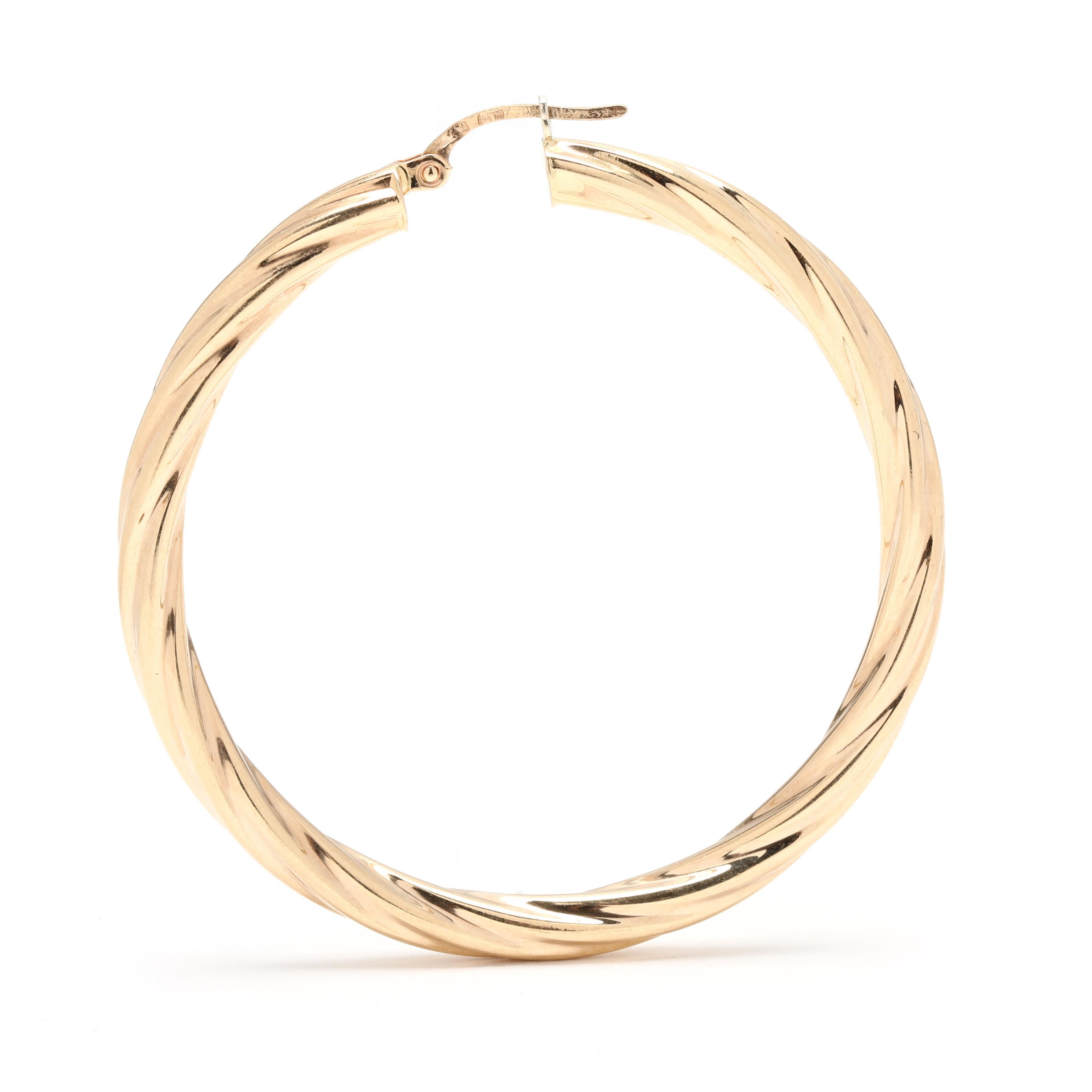 Grandes boucles d'oreilles tourbillon, or jaune 14 carats, longueur 1,88 pouces Bon état - En vente à McLeansville, NC