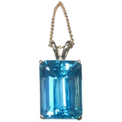 Large Swiss Blue 9.70 Carat Emerald Cut Blue Topaz Gold Pendant Necklace