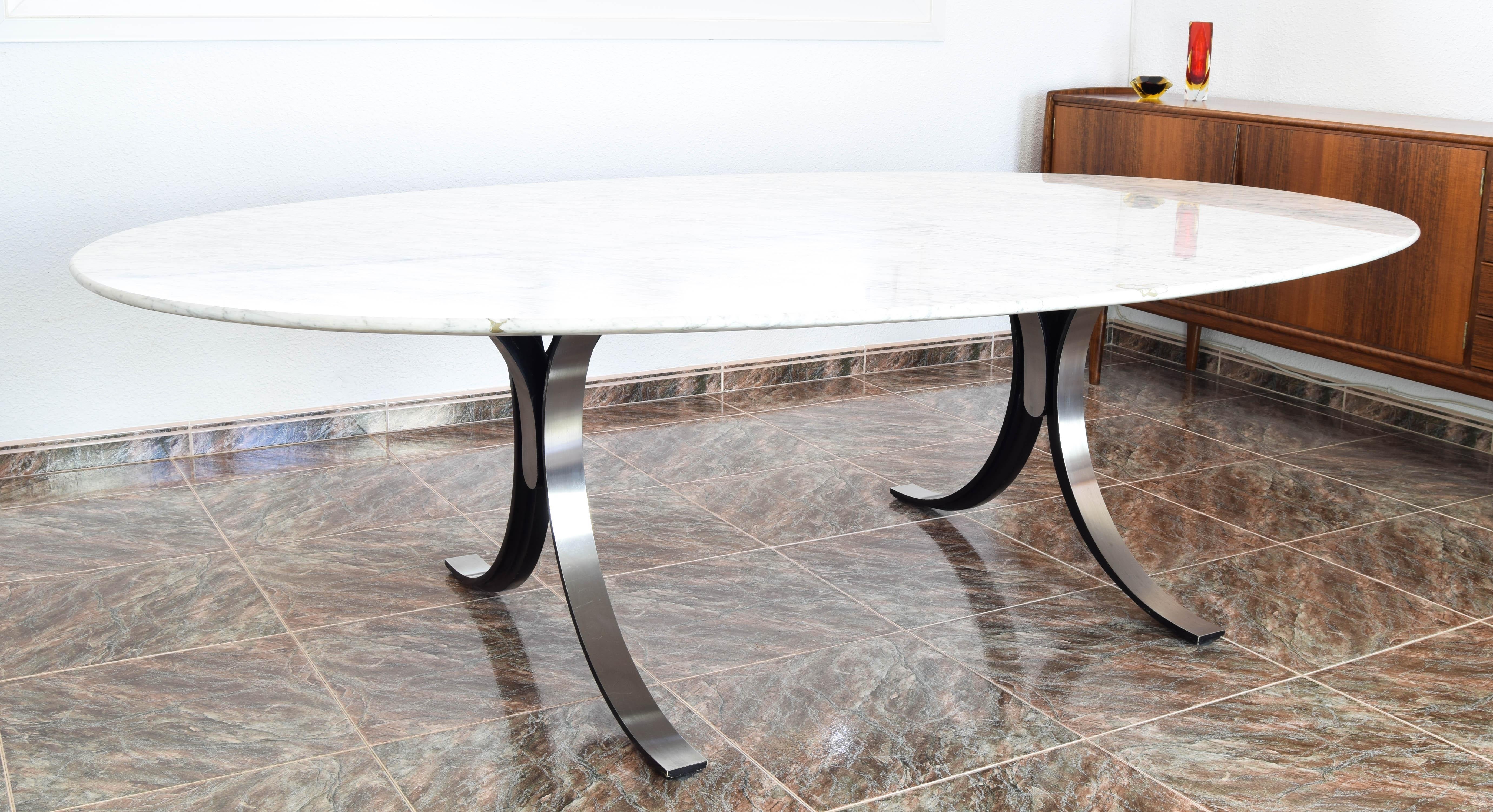 Luxurious Extra large T102 table.

 Osvaldo Borsani and Eugenio Gerli for Tecno, T102 conference or dining table, marble and steel, Italy, 1964.

Oval dining table with Carrara marble top and steel base. The characteristic of this table is the base,