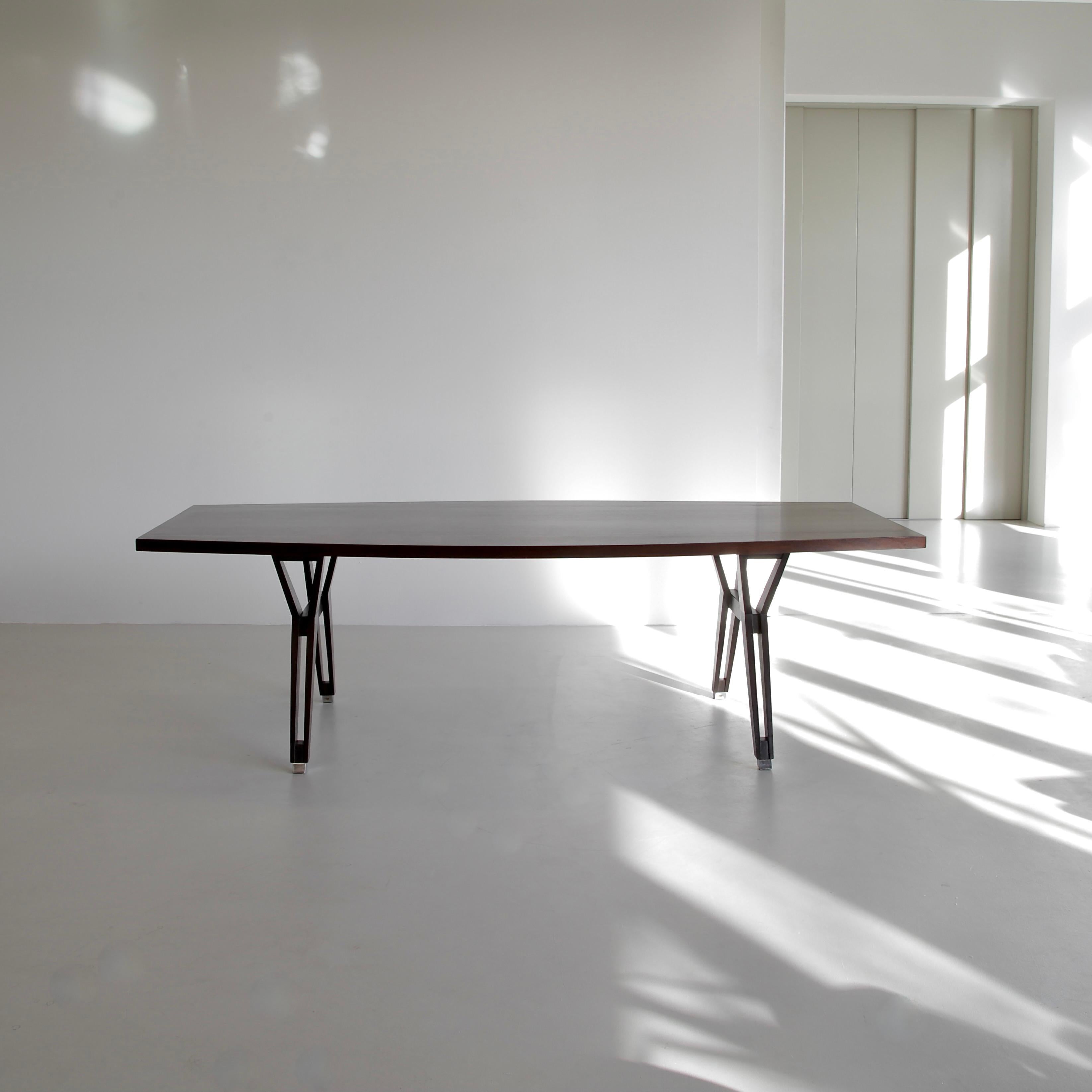 Table 'Tolomeo' designed by Ico Parisi & Ennio Fazioli. Italy, MIM Roma, 1963.

Wooden table, extensively re-designed by Ennio Fazioli in the 1960s using Ico Parisi's 'Terni' desk (1958) as the basis. Elegant boat-shaped tabletop and the typical