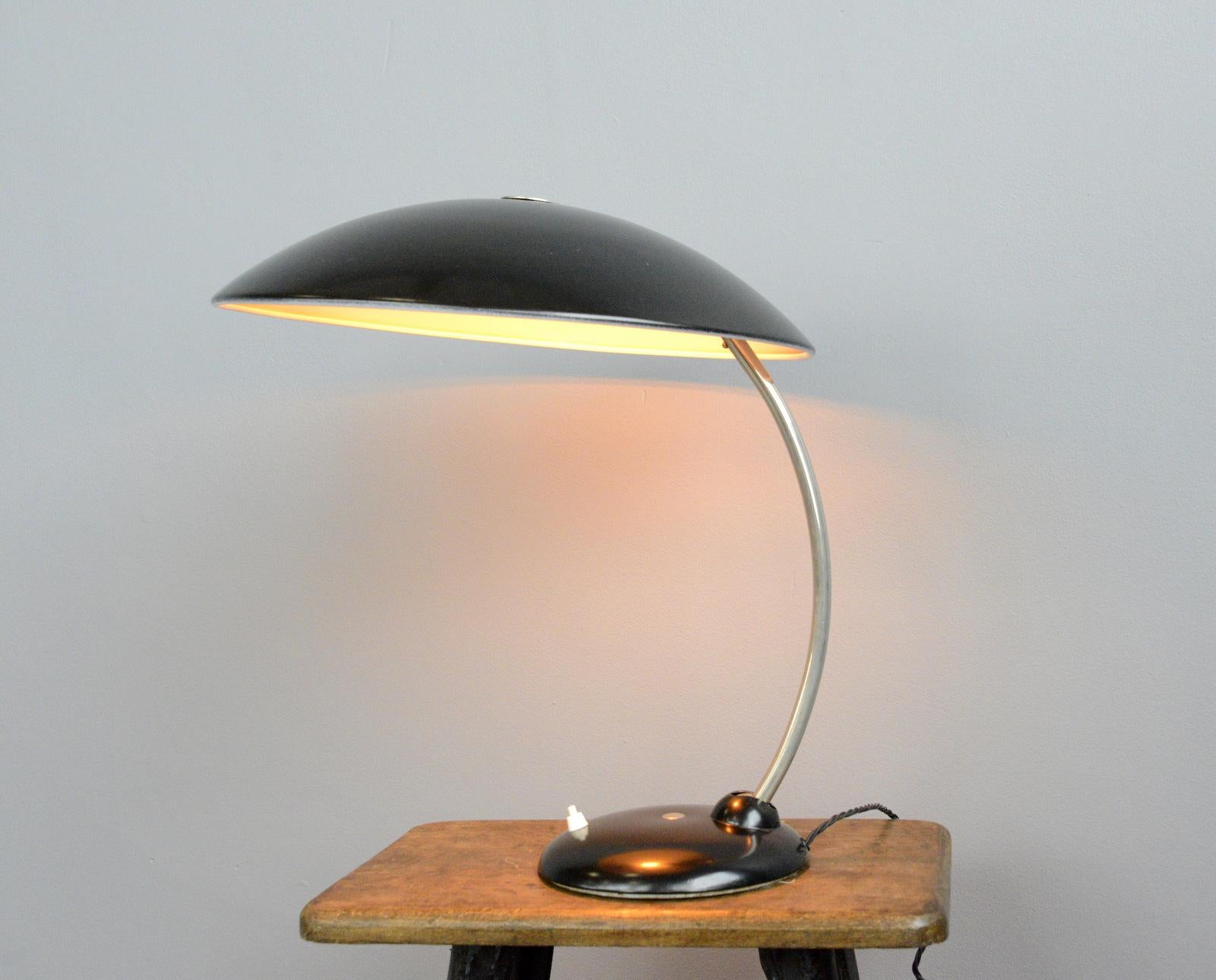Large table lamp by Hala, circa 1940s

- Aluminium shade with chrome arm
- Switch on the base
- Takes E27 fitting bulbs
- Made by Hannoversche Lampenfabriek (Hala)
- German, 1940s
- Measures: 46cm wide x 46cm tall x 60cm deep

Condition