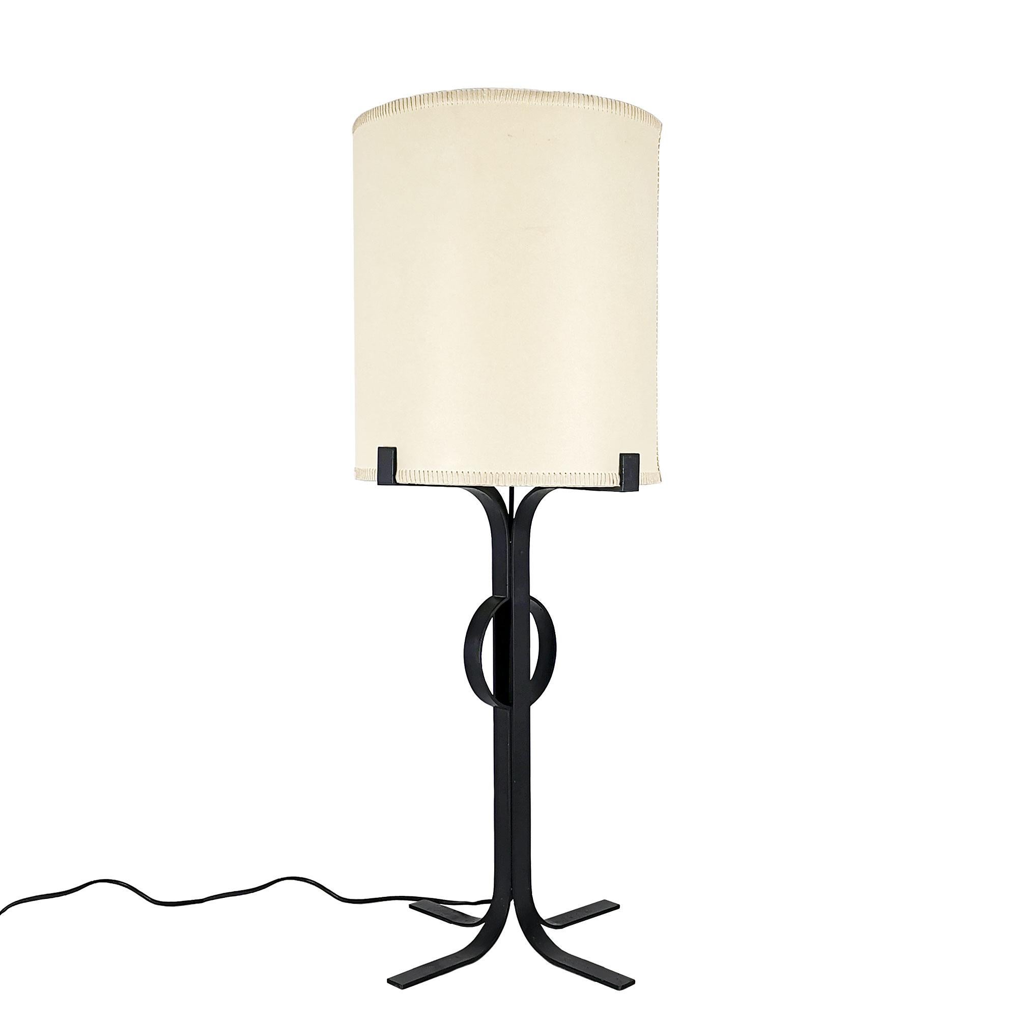 Large table lamp, wrought iron with four feet, parchment lampshade.

Design: Jordi Vilanova 

Spain, Barcelona c. 1960.
