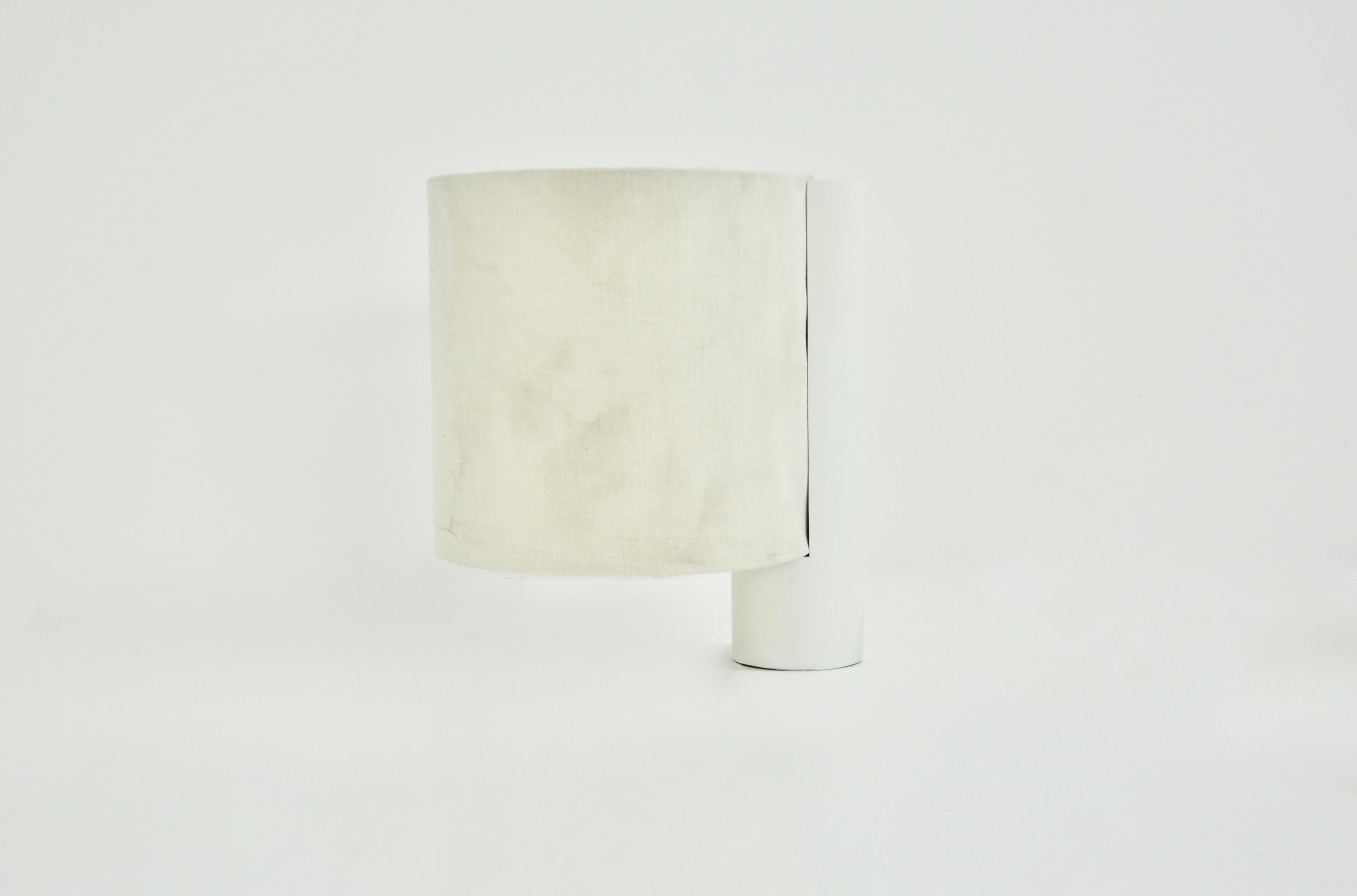 Large white lamp with metal base and fabric shade designed by Giulana Gamigna. Model: Fluette.  Possibility of lighting only the bottom or the top or even both sides of the lamp. Wear due to time and age of the lamps