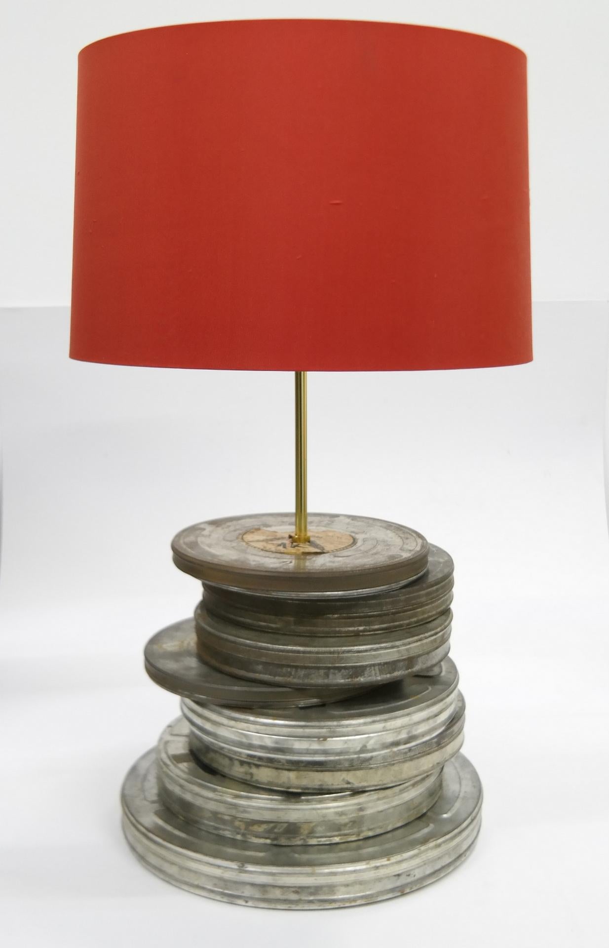 Large table lamp from movie film cans, electronically restored.