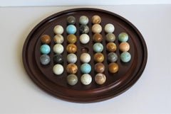 Grand jeu de solitaire en marbre de table avec 36 billes en pierre minérale:: vers 1940