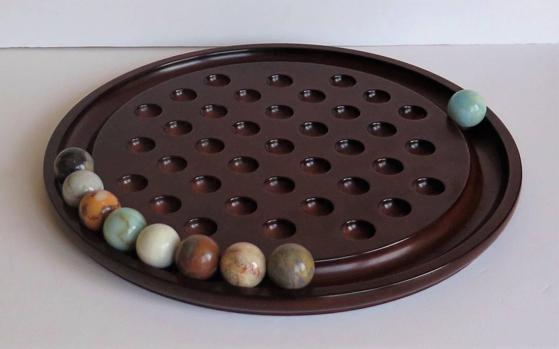 Large Table Marble Solitaire Game with 36 Mineral Stone Marbles, circa 1940 In Good Condition In Lincoln, Lincolnshire