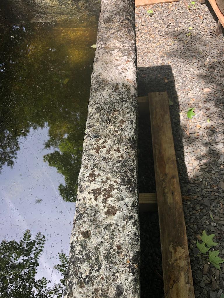 This stunning trough is unusual in its form, being that it is taller and more narrow than others we have seen. This makes it a great candidate for a spot where you need a water feature (or planter) that is long on looks, has great height but where