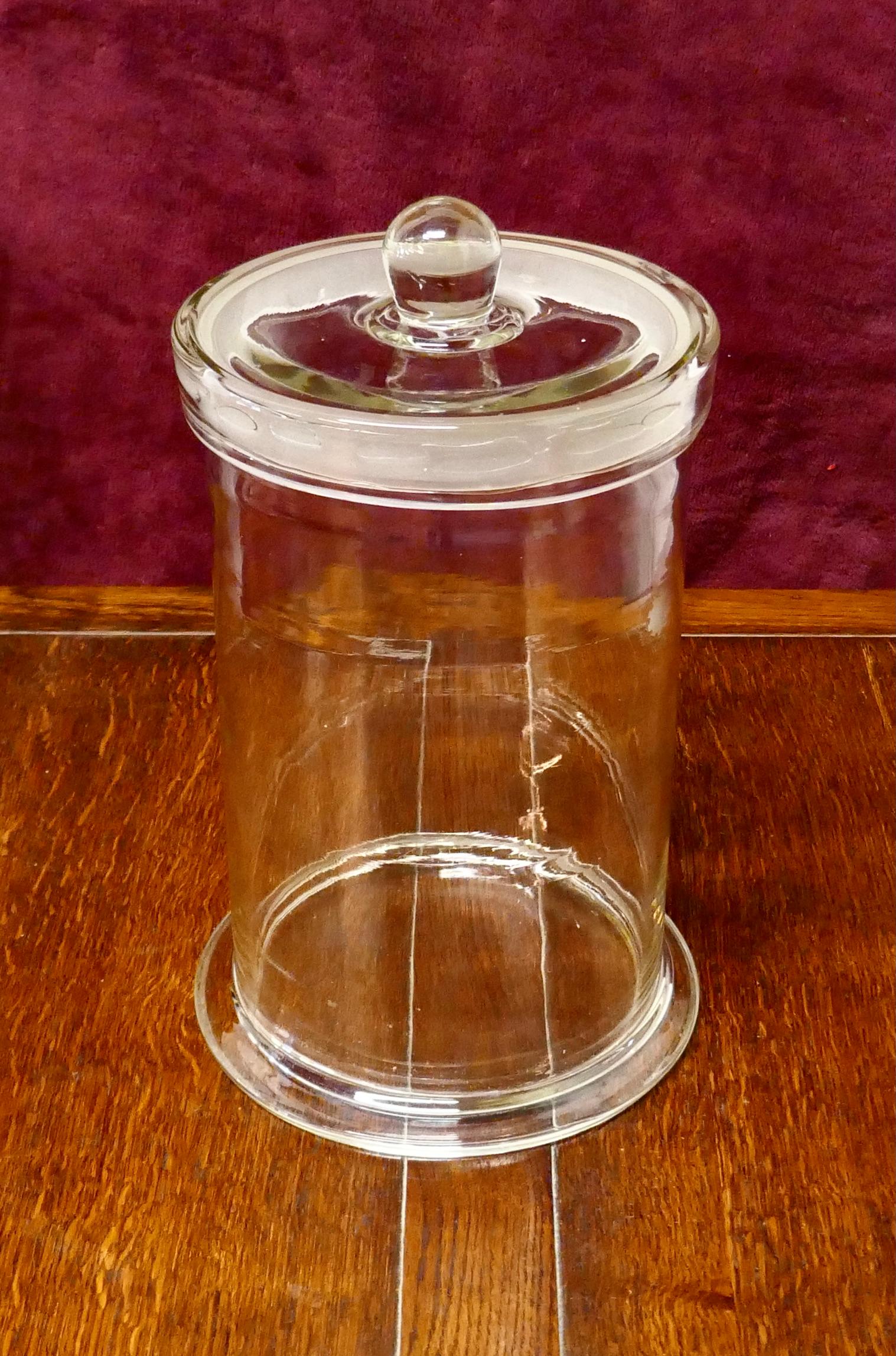 Large tall storage jar, shop display

This is a tall straight sided storage jar with a tight fitting lid, ideal for pasta but with many other uses

The jar is 14” tall and 9” in diameter
TNV122.