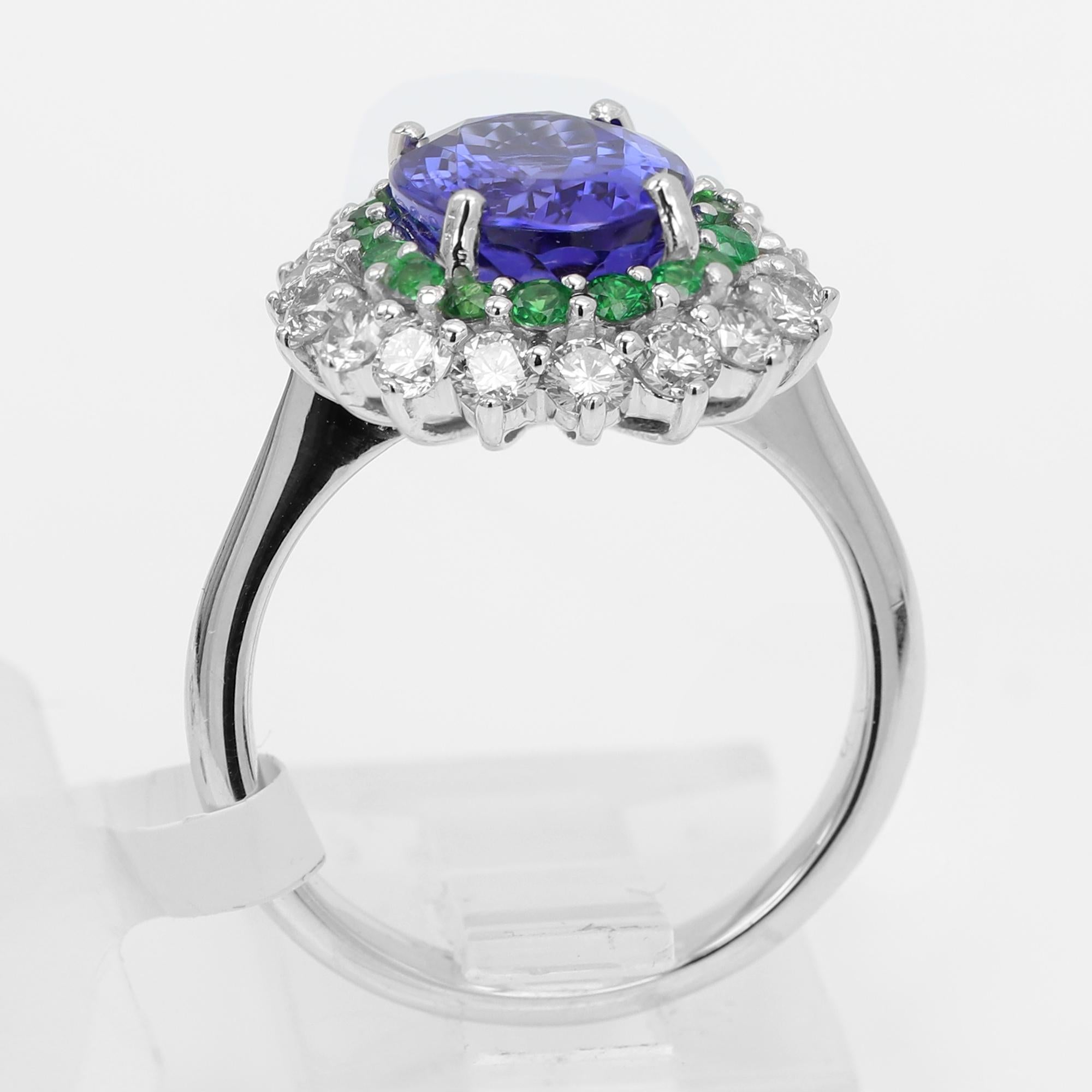 Large Tanzanite 4.20 Carat Diamond Tsavorite Ring 18 Karat Gold For Sale 3