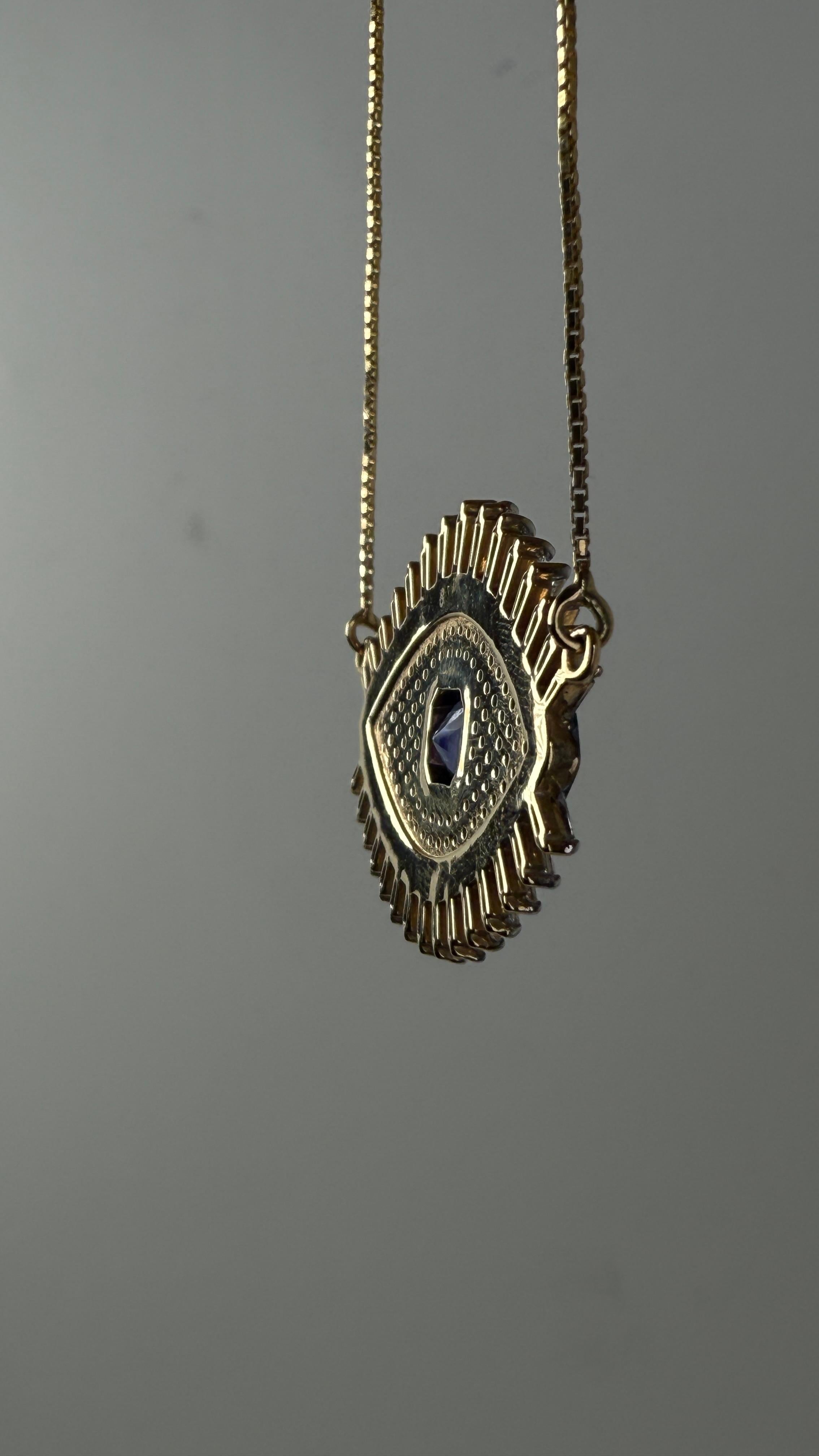 Ciondolo a forma di occhio maligno con tanzanite e diamante in oro 18 carati in vendita 1