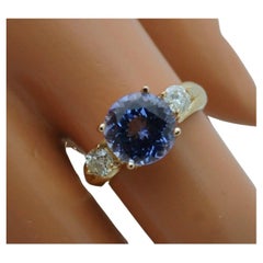 Large tanzanite diamond ring 18KT yellow gold engagement ring