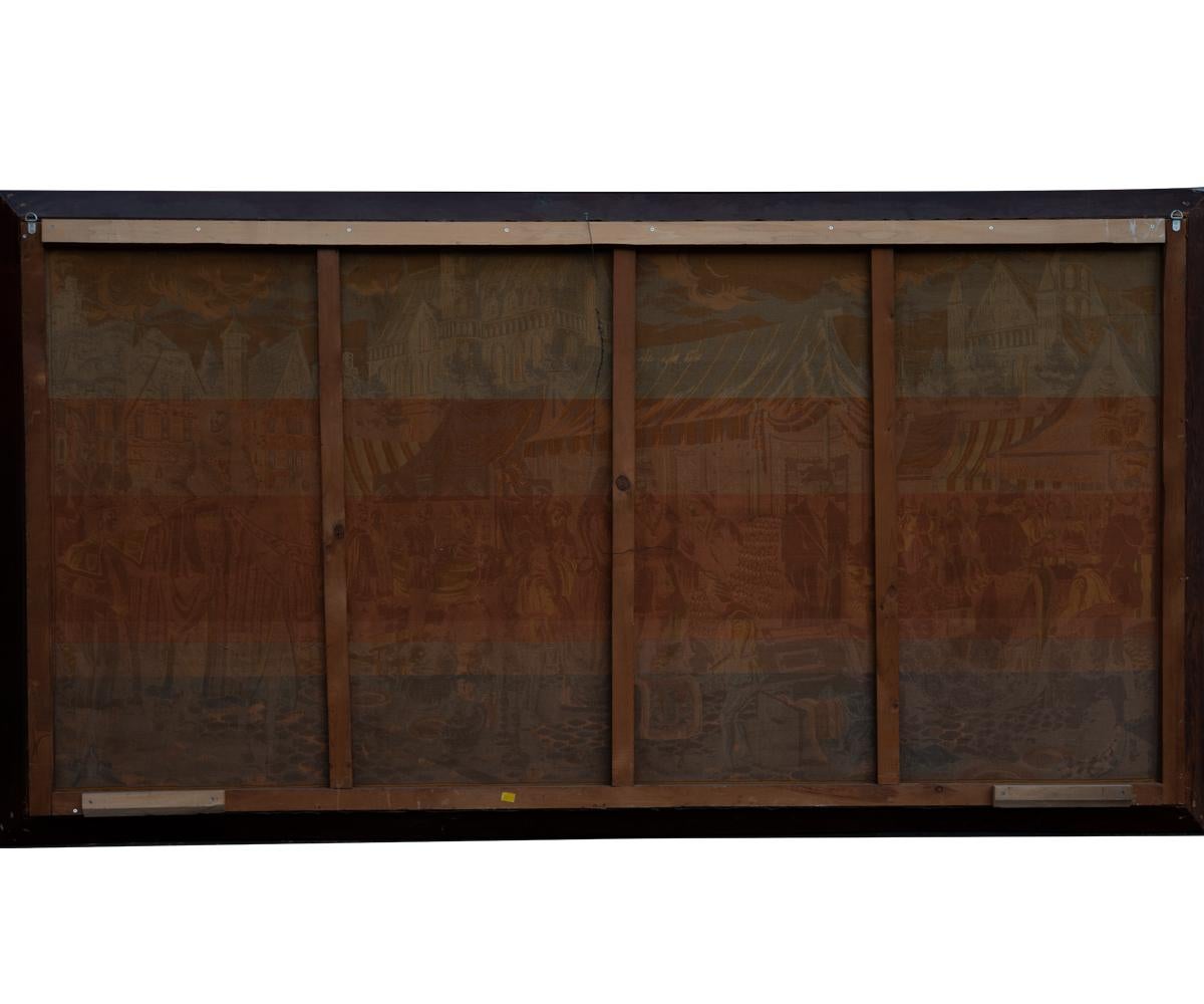 Offered is this fine tapestry featuring a market scene with much activity including maidens and horsemen. It is a happy and uplifting piece of artistry with quite a bit of activity from the subjects as they interact.