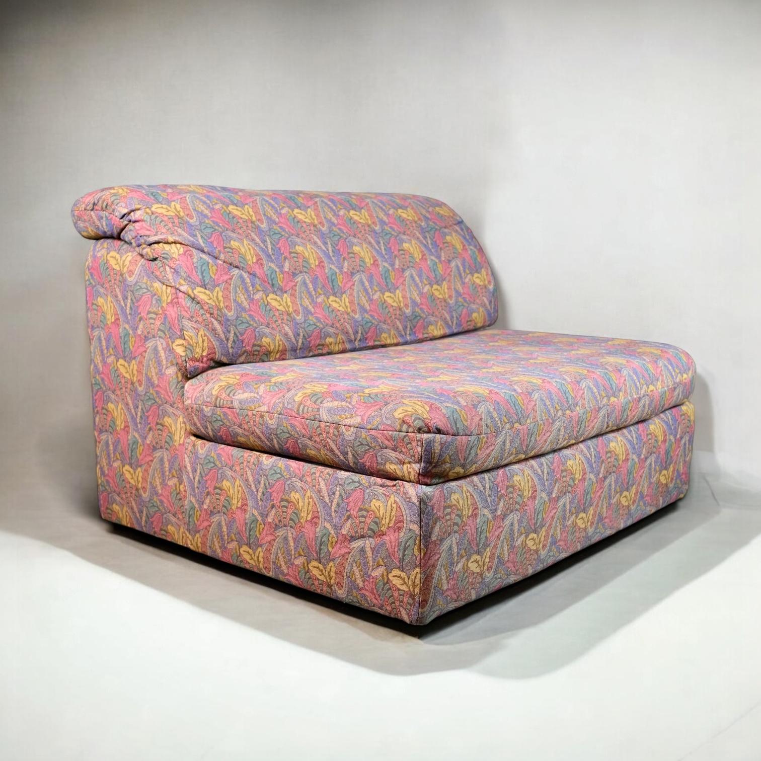 Beautiful and large armchair or small sofa by Beka, made in France in the 1970s.
Tapestry style fabric, with colorful flowers and plants patterns.
Confortable and definitely a remarkable piece of furniture.
Very good condition, barely