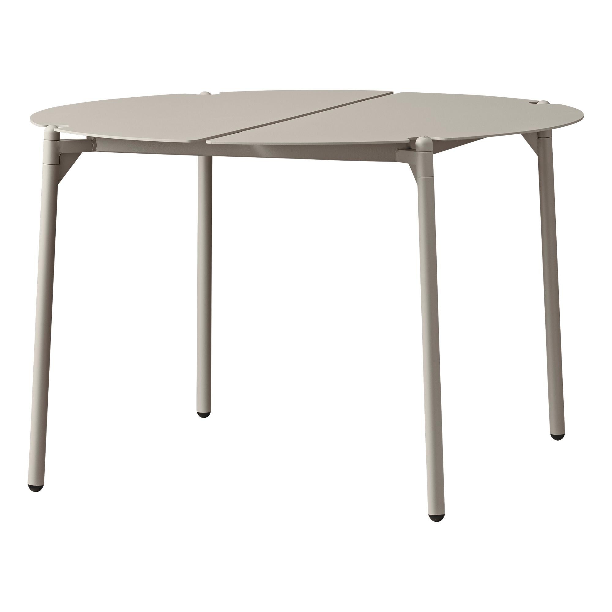 Large taupe minimalist lounge table
Dimensions: Diameter 70 x H 45 cm 
Materials: Steel w. Matte Powder Coating & Aluminum w. Matte Powder Coating.
Available in colors: Taupe, Bordeaux, Forest, Ginger Bread, Black and, Black and Gold. 

Place