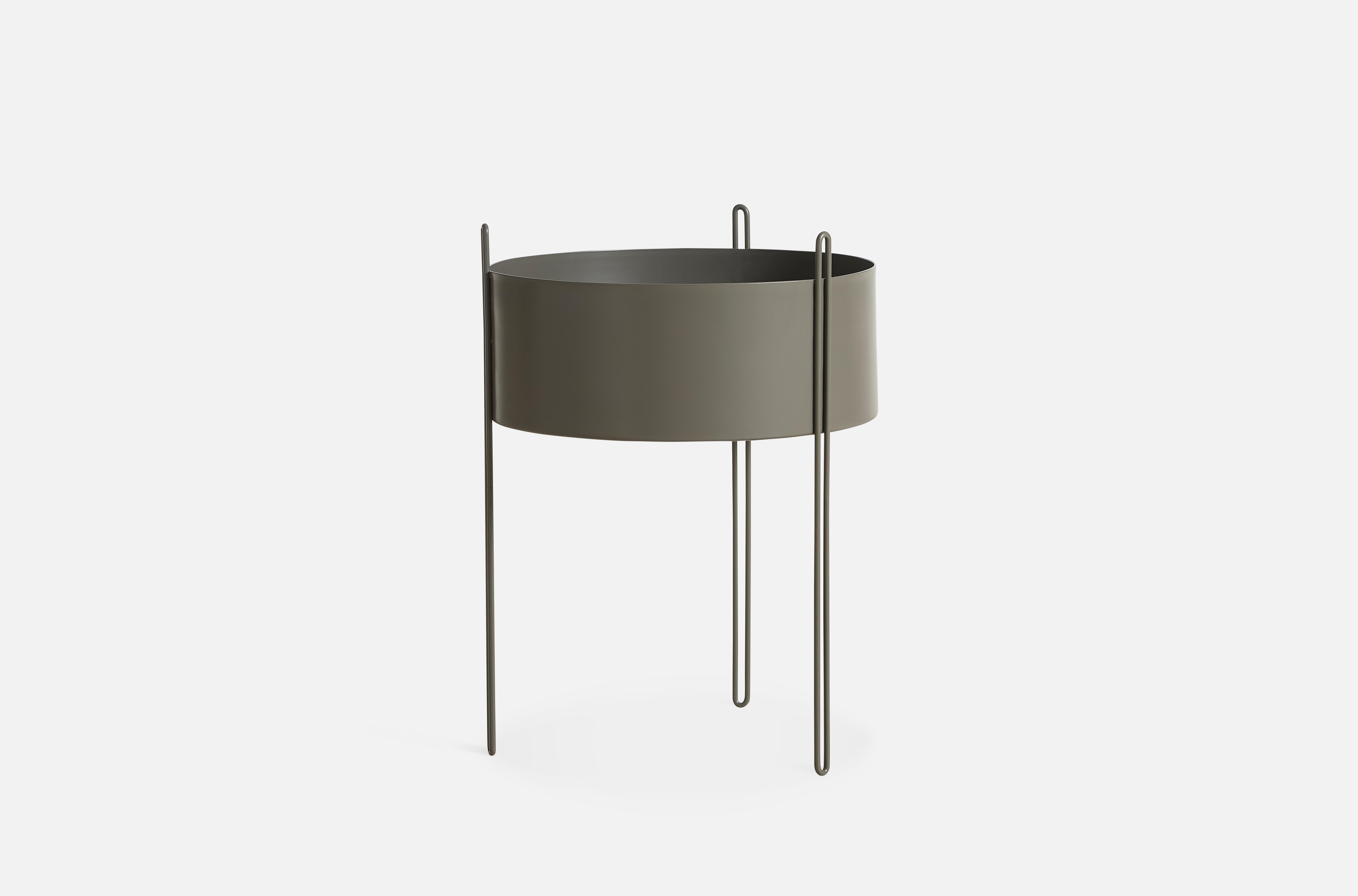 Large Taupe Pidestall planter by Emilie Stahl Carlsen
Materials: Metal.
Dimensions: D 40 x H 55 cm
Available in grey, red, taupe or black and in 3 sizes: D 15 x H 15, D 40 x H 35, D 40 x H 55 cm.

Emilie Stahl Carlsen is a Nor wegian designer