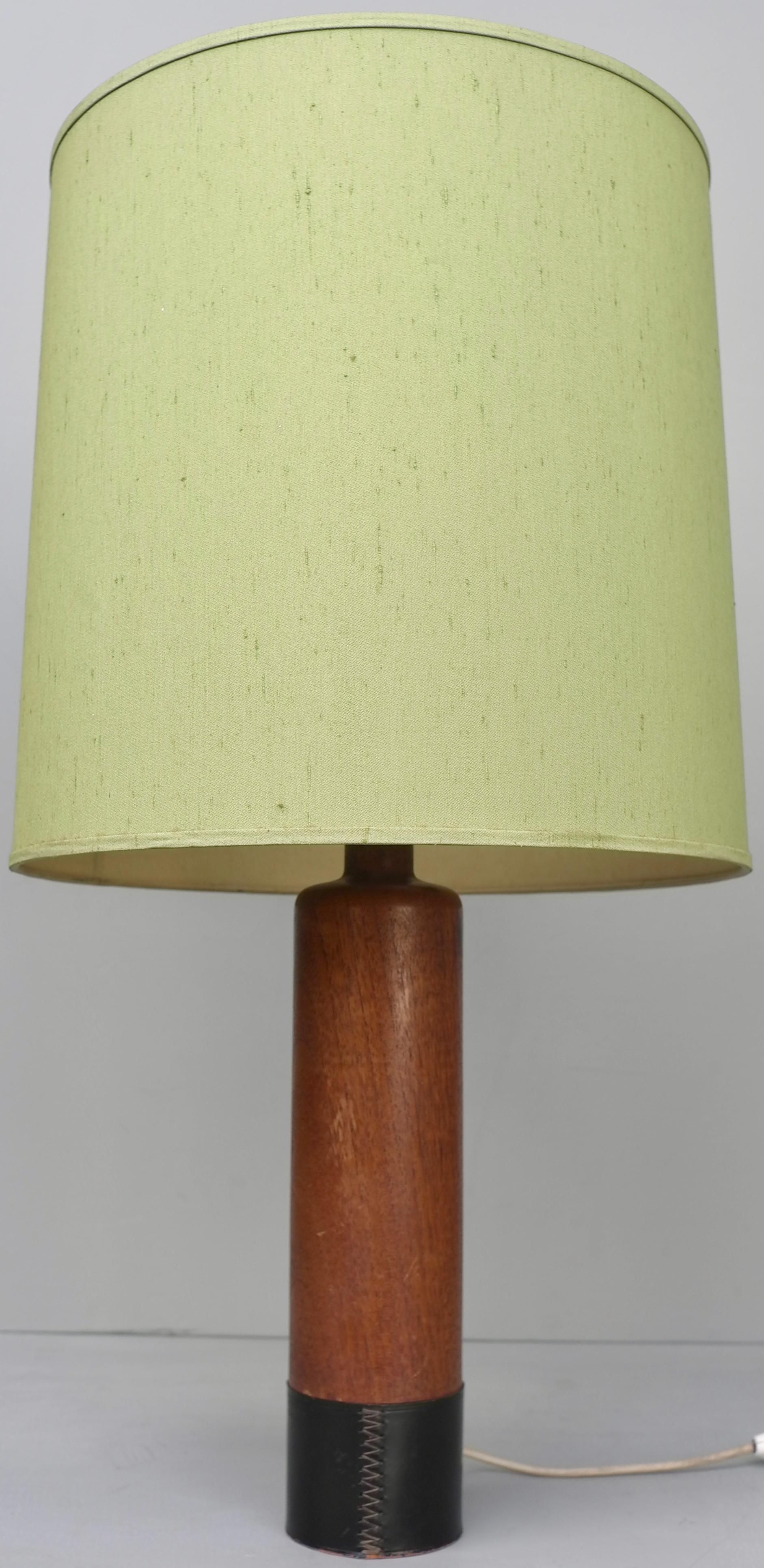 Large teak and leather stitched Danish table lamp with green silk lampshade.