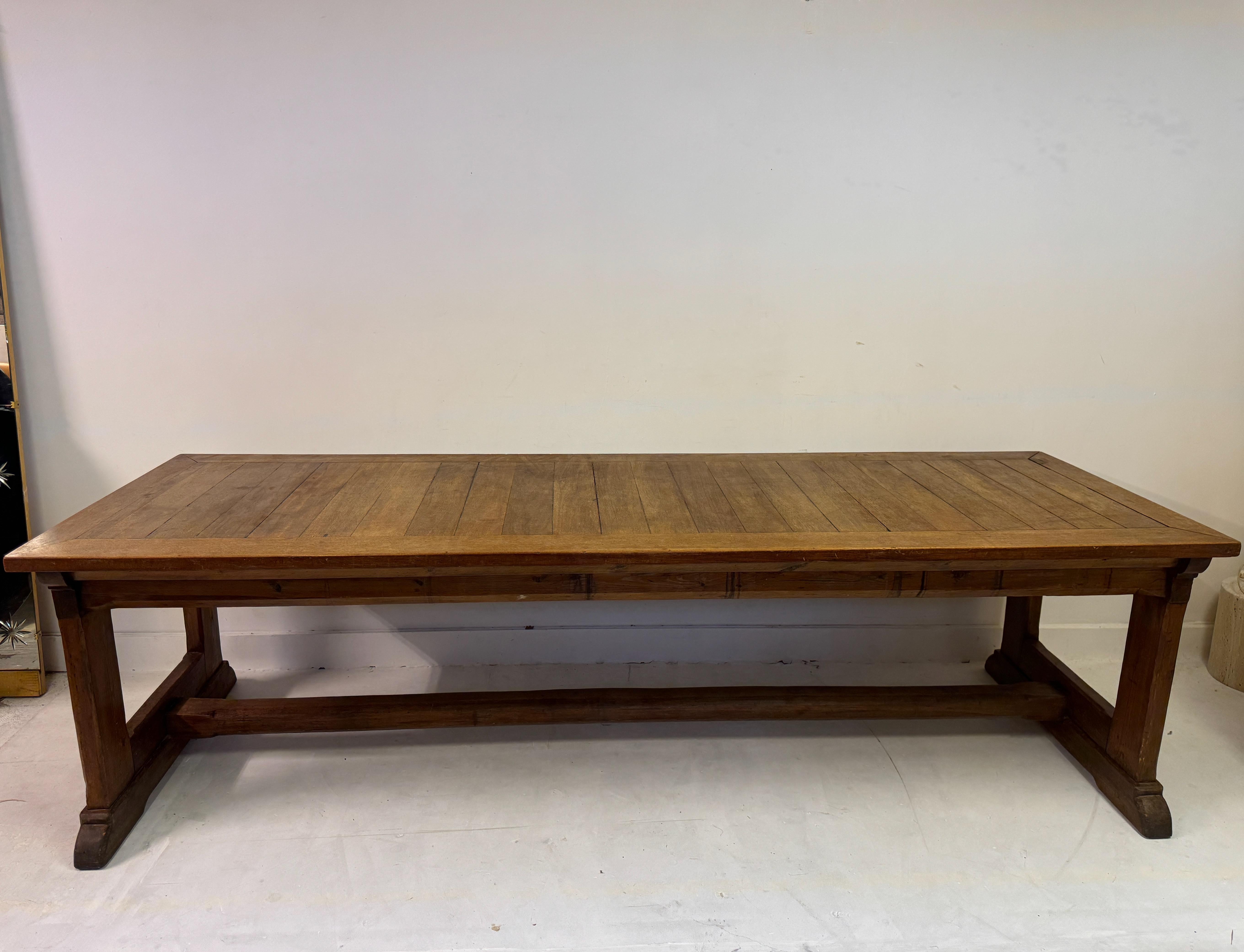 Refectory table

Teak and pine

Cleated plank top

Nice industrial screw details

Eary to mid 20th Century England

This refectory table is a fine example of traditional craftsmanship, perfect for adding a touch of rustic charm to any dining space.