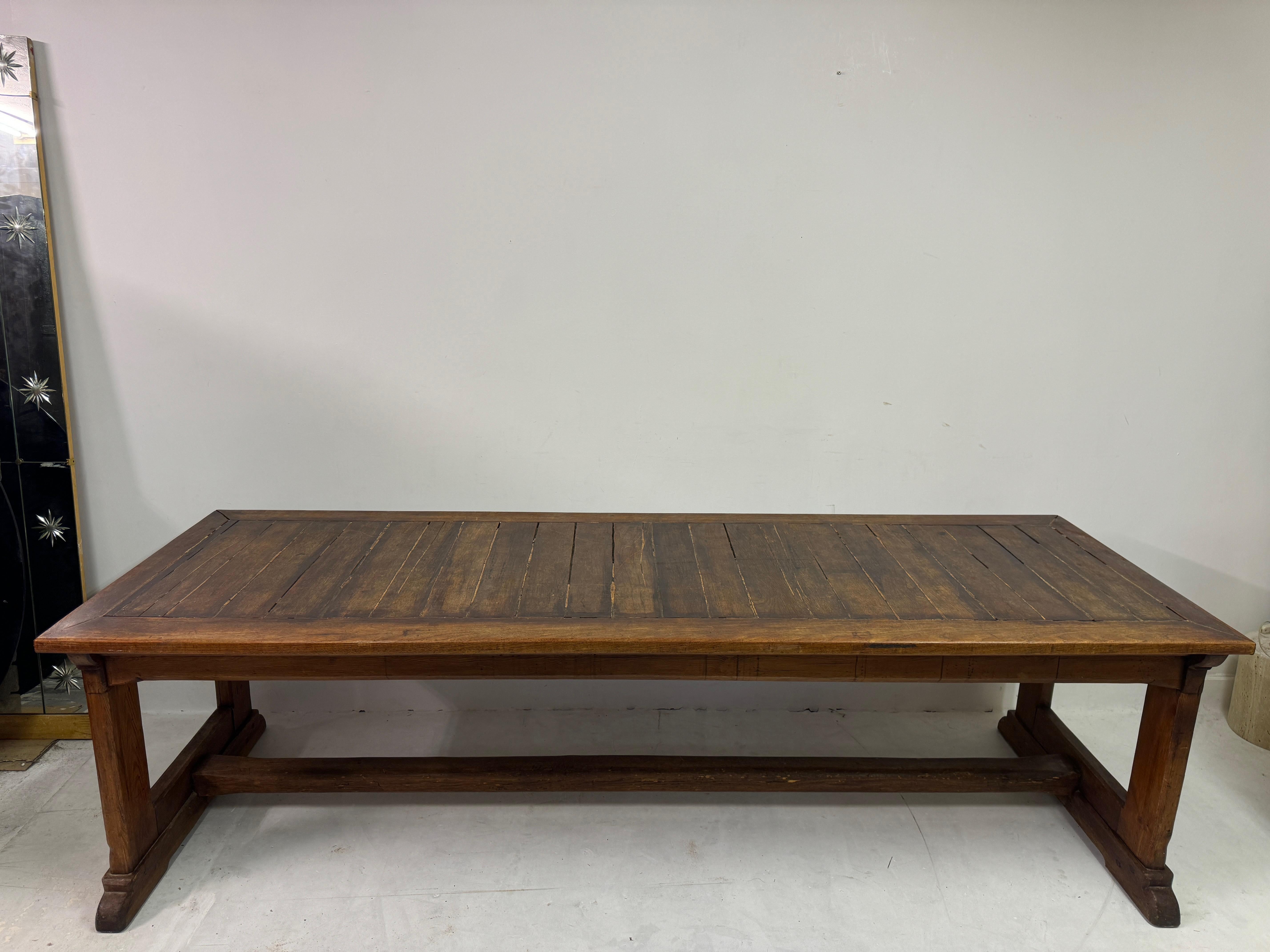 Refectory table

Teak and pine

Cleated plank top

Nice industrial screw details

Early to mid 20th Century

England

This refectory table is a fine example of traditional craftsmanship, perfect for adding a touch of rustic charm to any dining