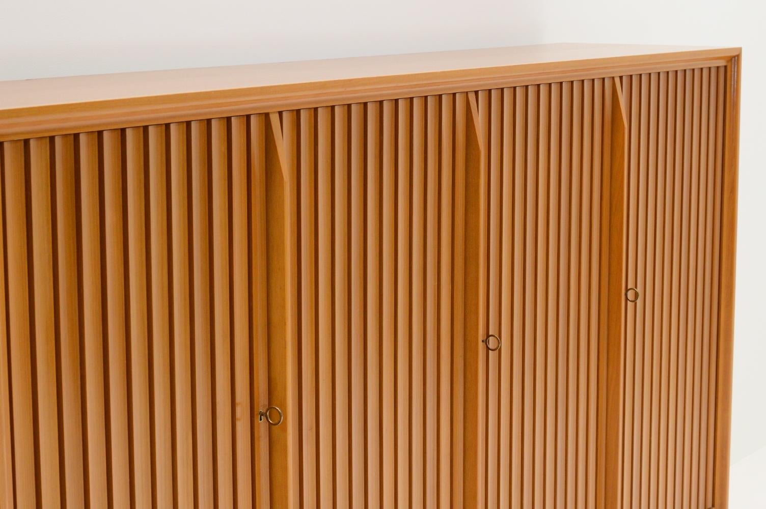 Teak Large teak highboard by Leo Bub for Bub Wertmöbel Germany 1970s.