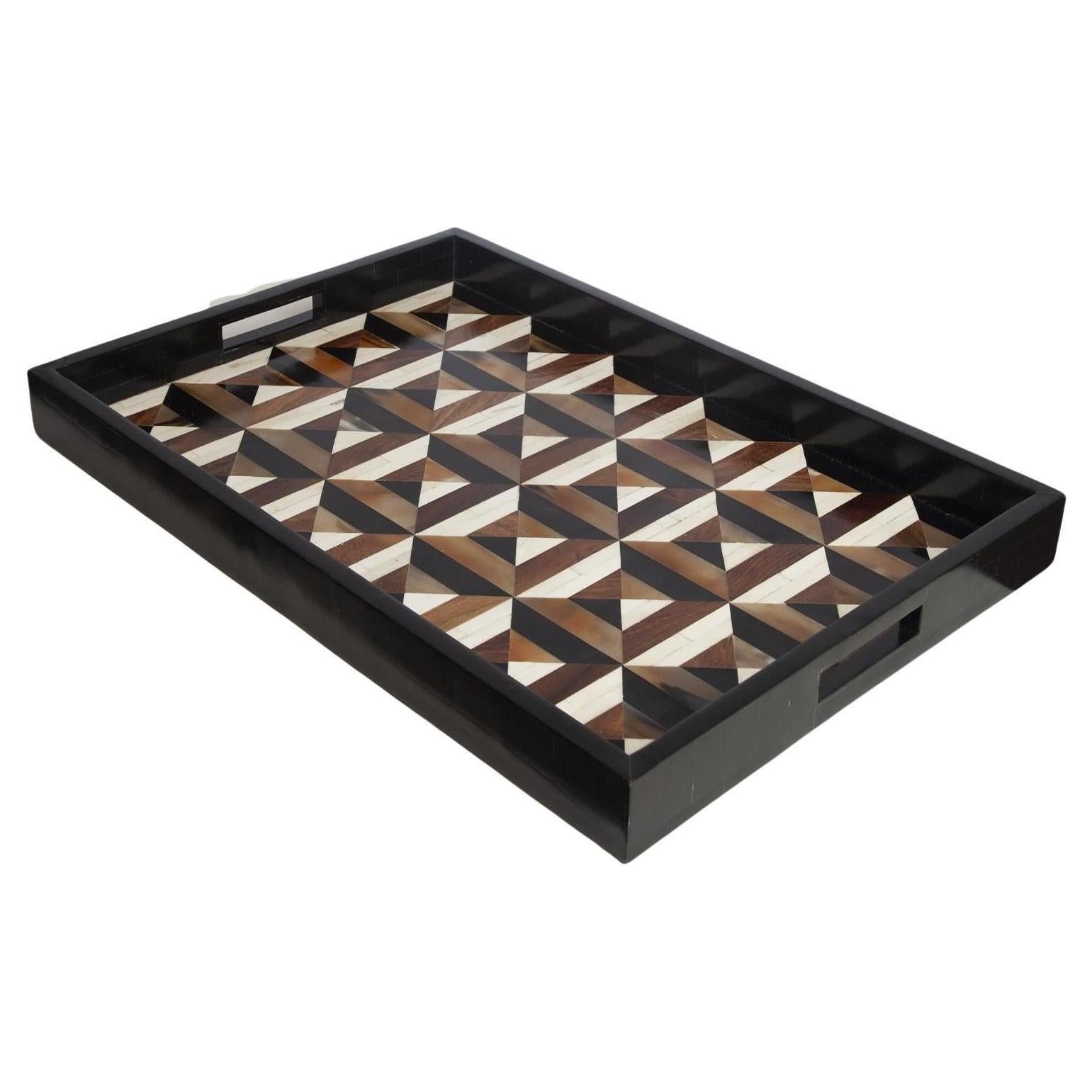 Large Marquette Tray large fitted with bone, horn resin, and teak inlays
Optical pattern formed with hand-appliqued detailing
Sourced by Martyn Lawrence Bullard 
