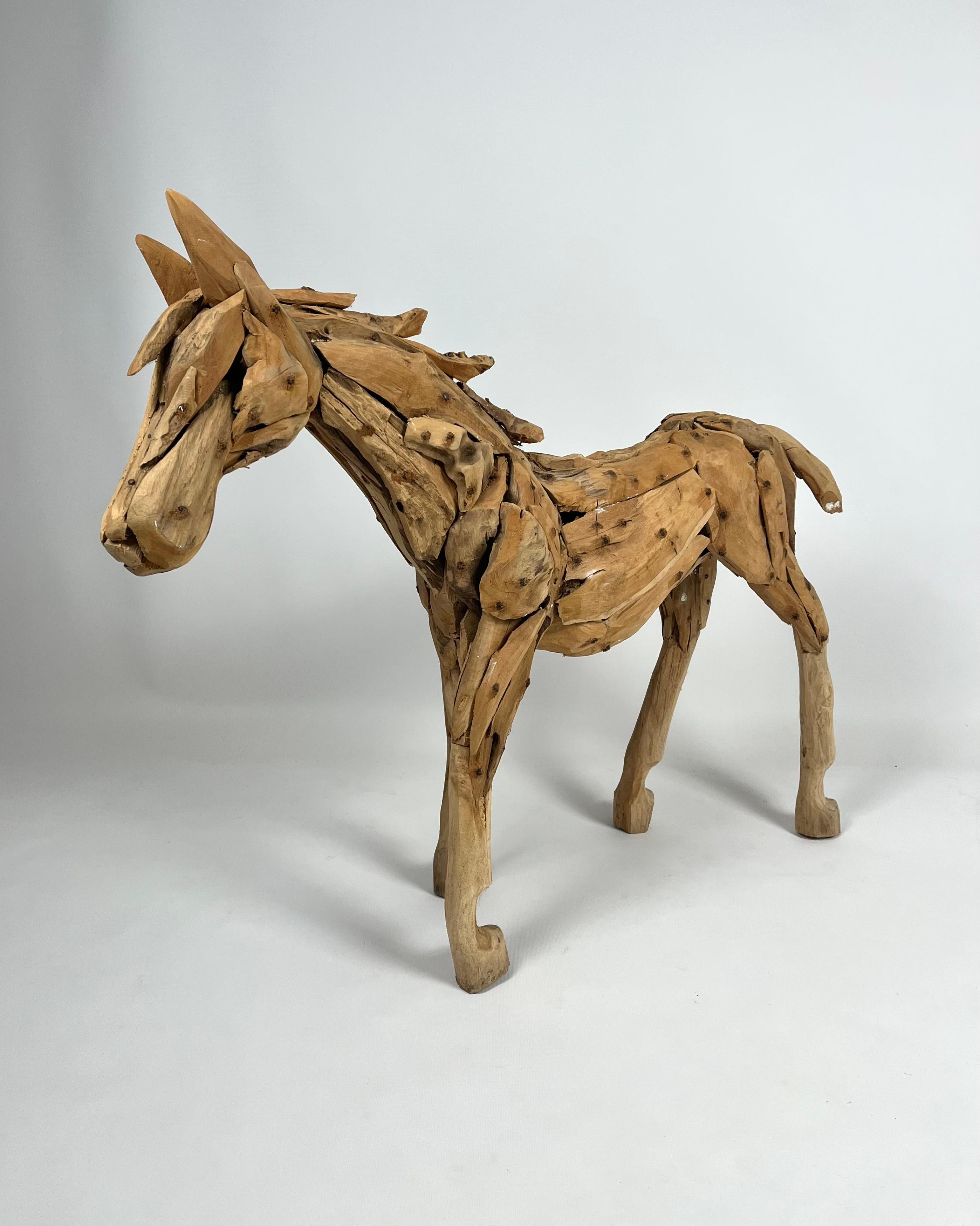 Indonesian Large teak sculpture of a foal For Sale