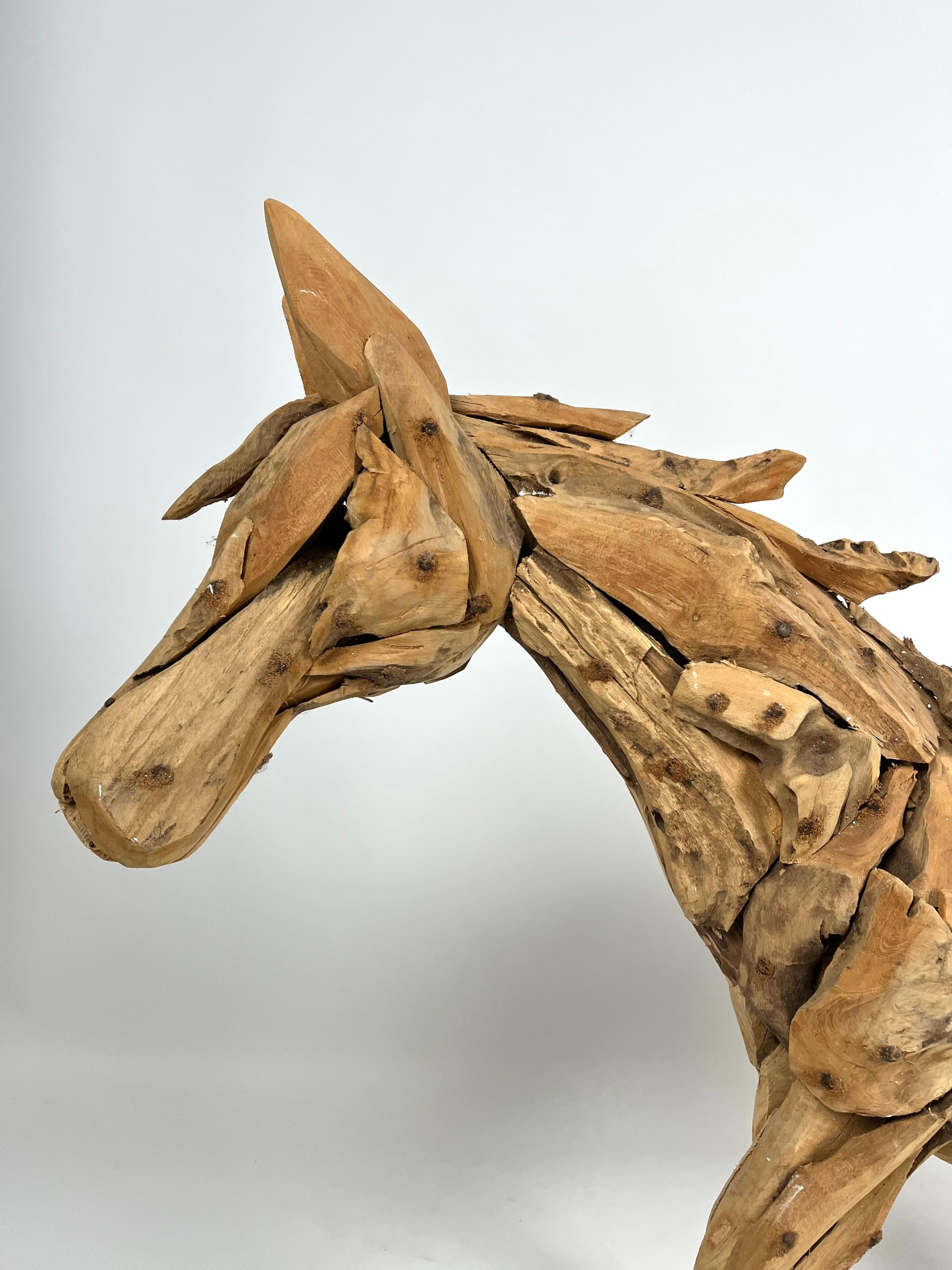 Large teak sculpture of a foal For Sale 1