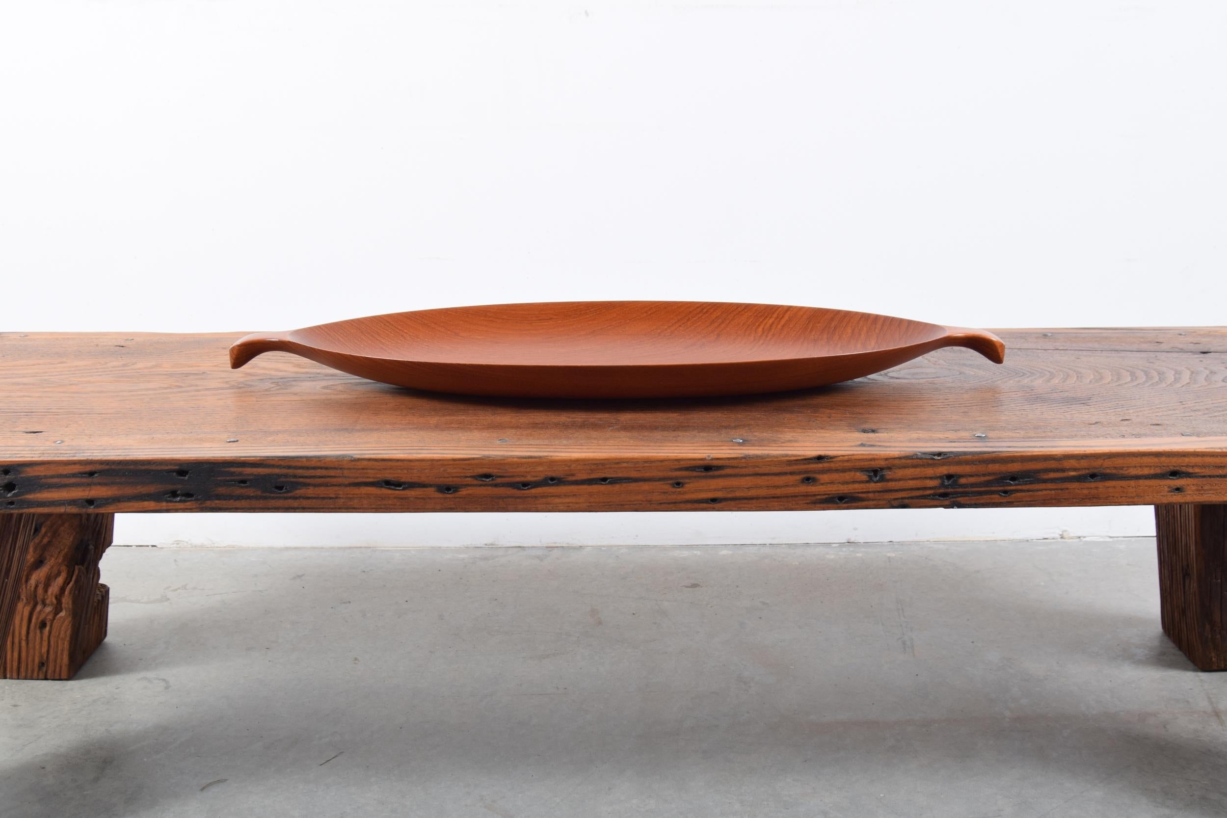 Magnificent and large solid teak tray, circa 1960. Produced by AL-BO of Denmark. The grain of the old growth teak is stunning. Patina to teak is absolutely perfect. Just what you would expect from a 60 year old piece of well kept teak. Tray