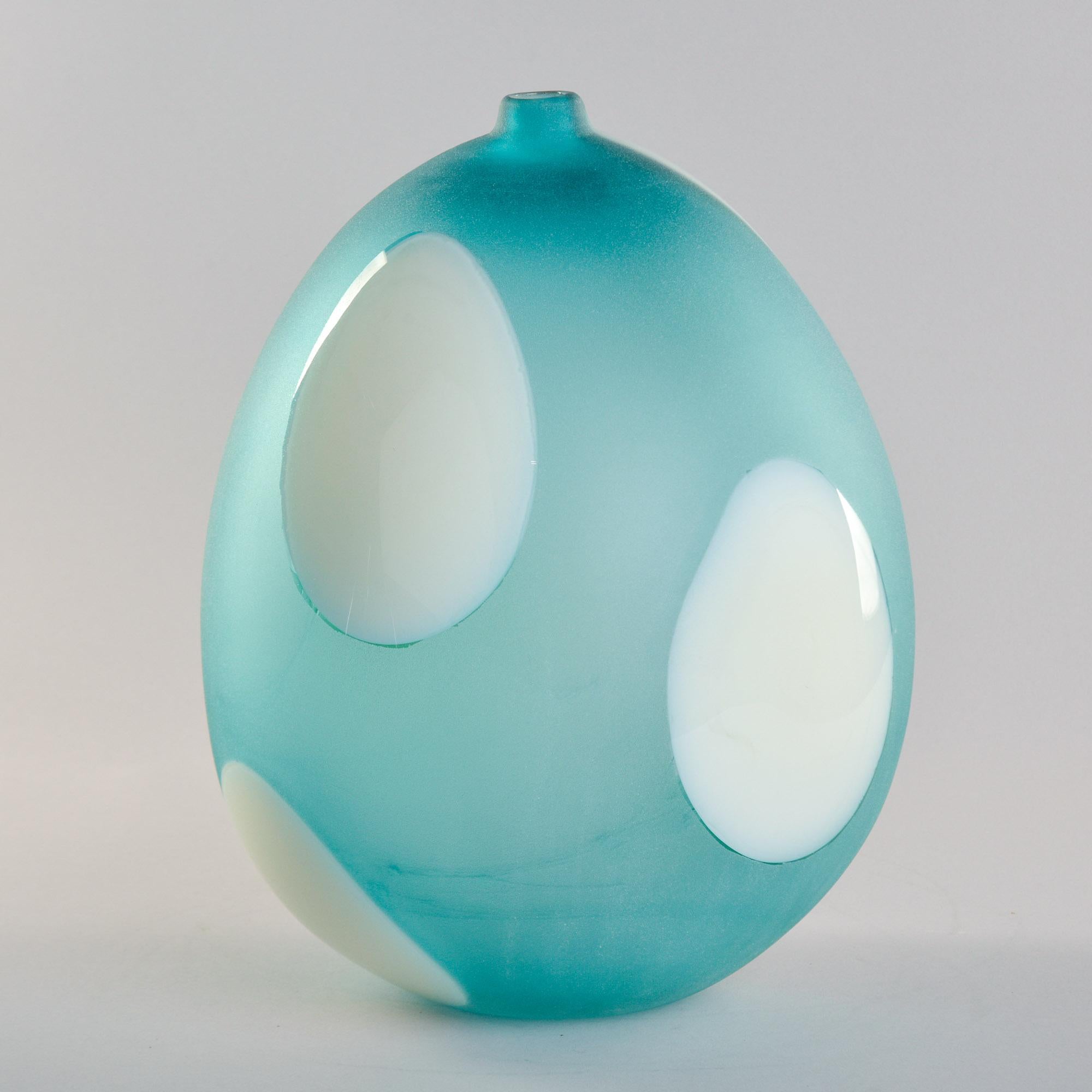 Vintage Murano glass vase by Anfora in pale teal and white glass dates from the 1990s.  Tall vase (14.5” tall) is rounded tear drop shape with a narrow mouth/lip and has an etched signature on underside of base. Pale teal color satin Murano glass