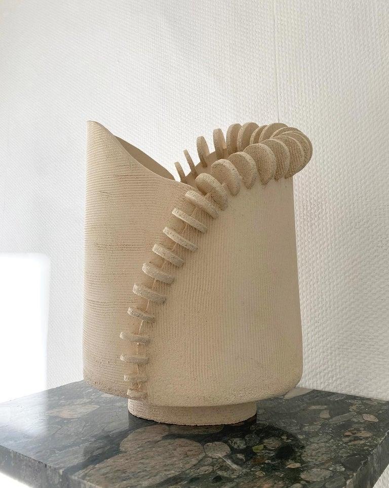 Large Tempo Sculpture by Olivia Cognet
Materials: Ceramic
Dimensions: W 35 x H 55 cm approx

Tempo
Dynamic sculptures decorated with textured, subtly imperfect disks, in which repetition echoes the art of embroidery.

Each of Olivia’s handmade