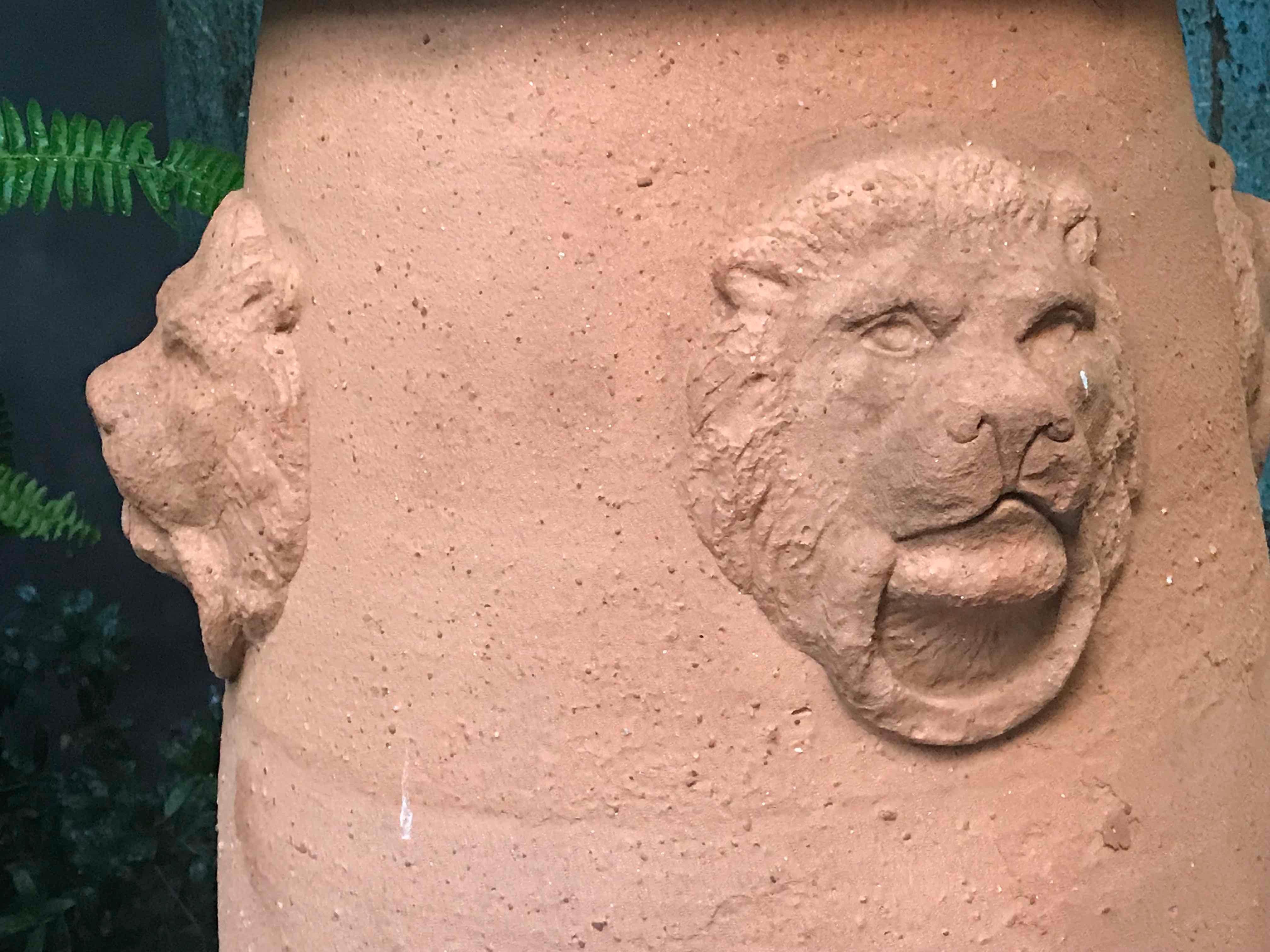 English Large Terra Cotta Garden Pot with Lion Engraving from Early 20th Century England