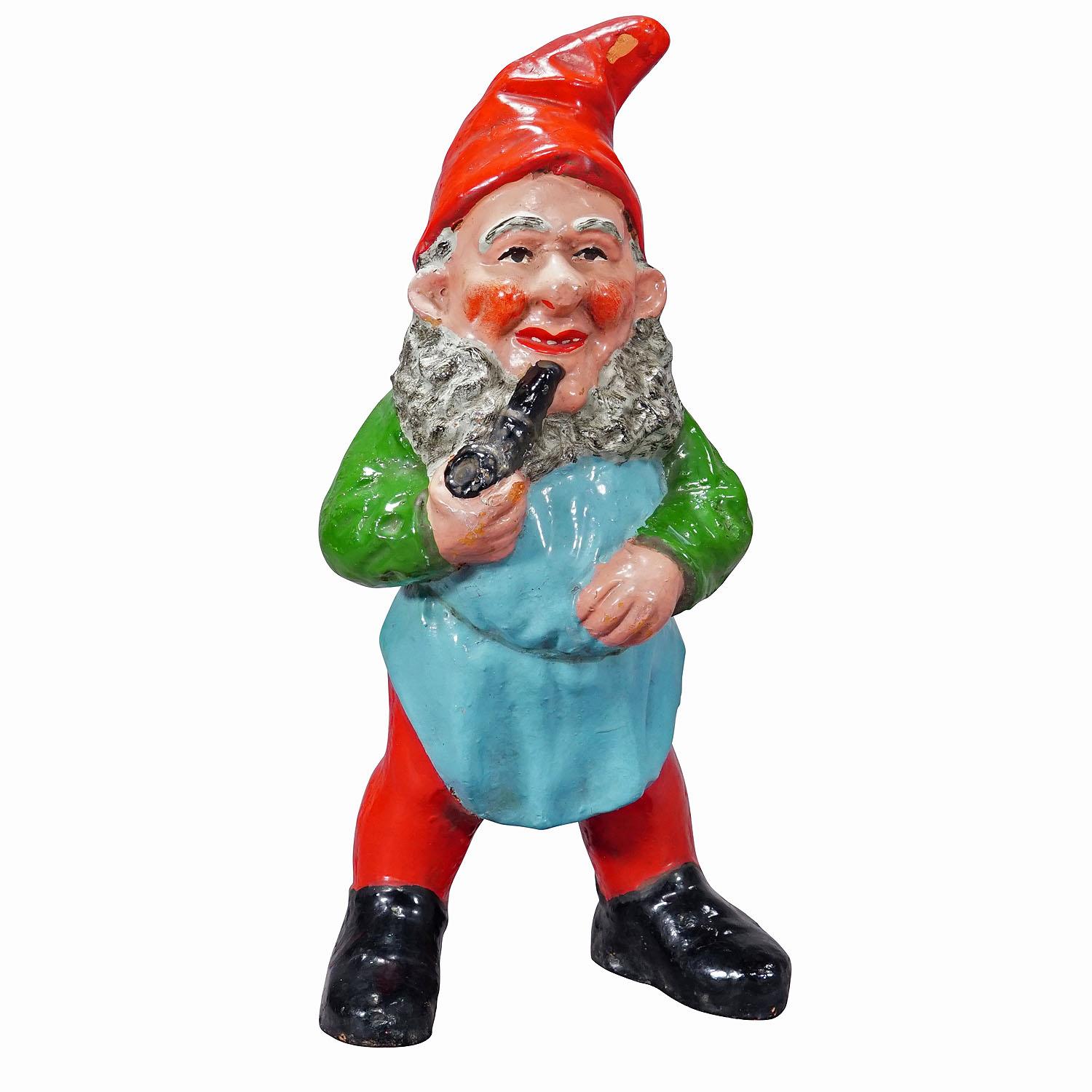 Large Terracotta Garden Gnome with Pipe, Germany ca. 1930s
Item e7193
A large garden gnome from Germany, ca. 1930s. The gnome has a pipe in his hand. Good used vintage condition with signs of wear commensurate with age. Some rubbed areas and