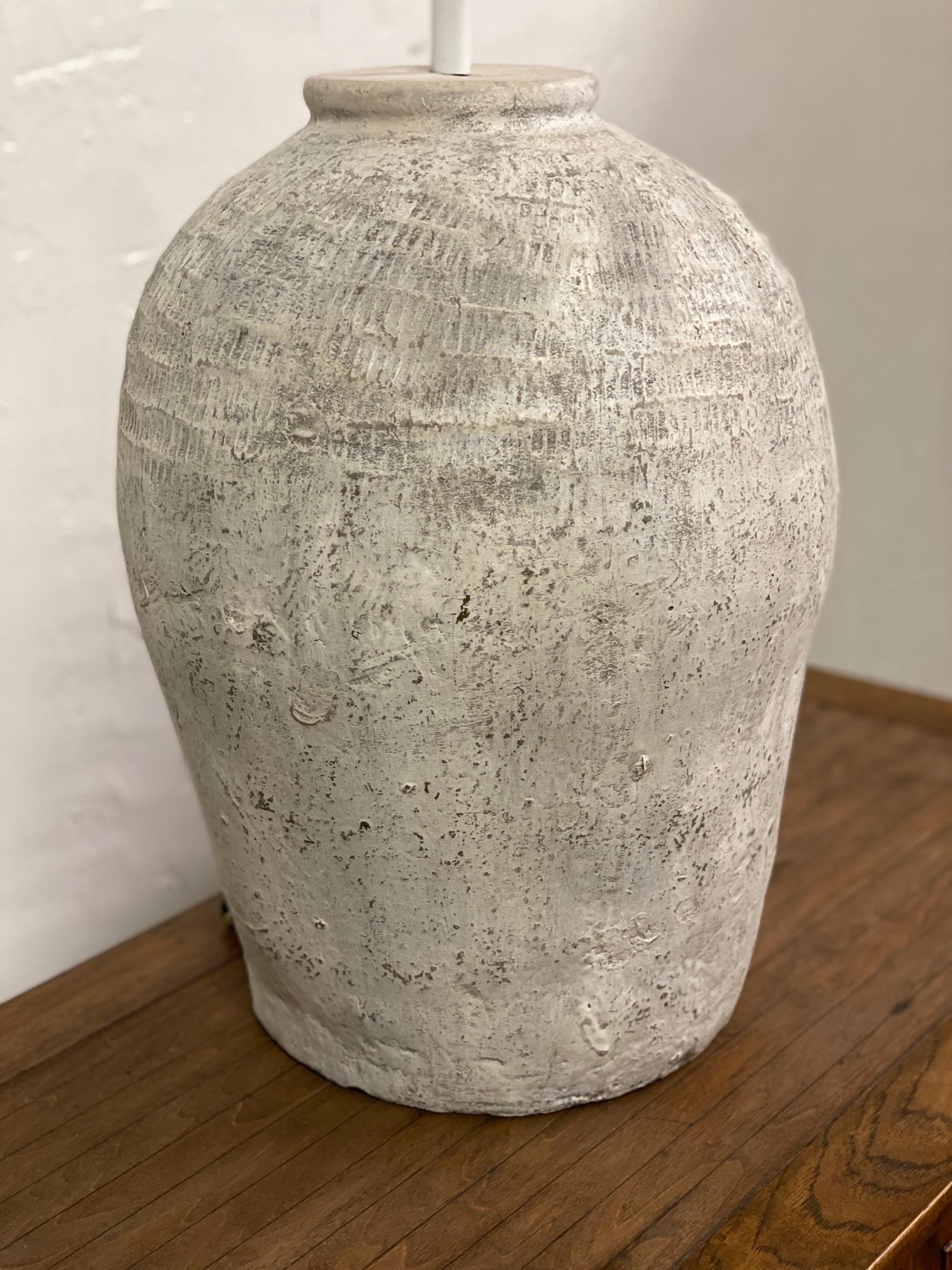 large terracotta lamp