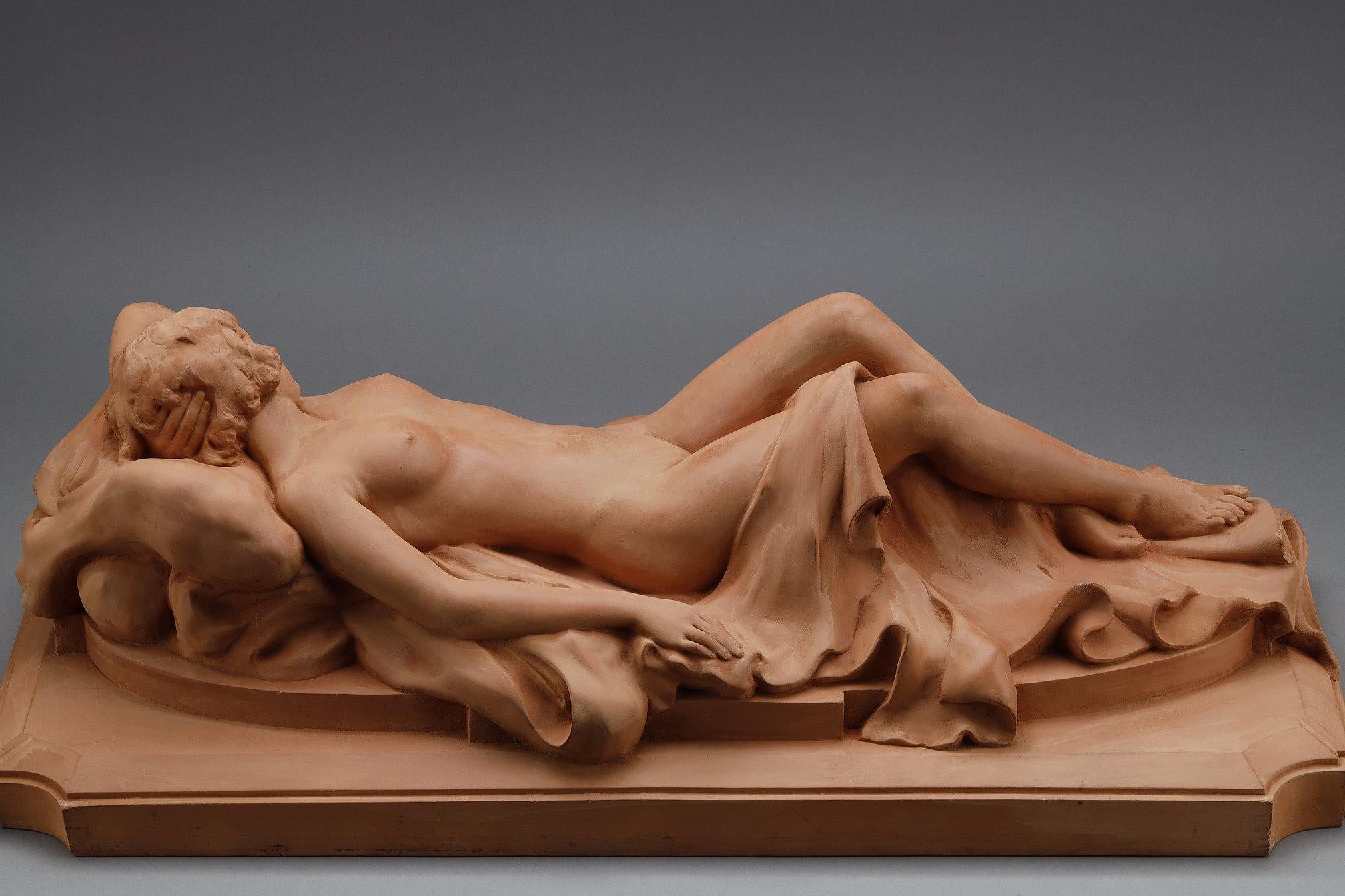 Large terracotta sculpture depicting an Odalisque reclining on a drape For Sale 6