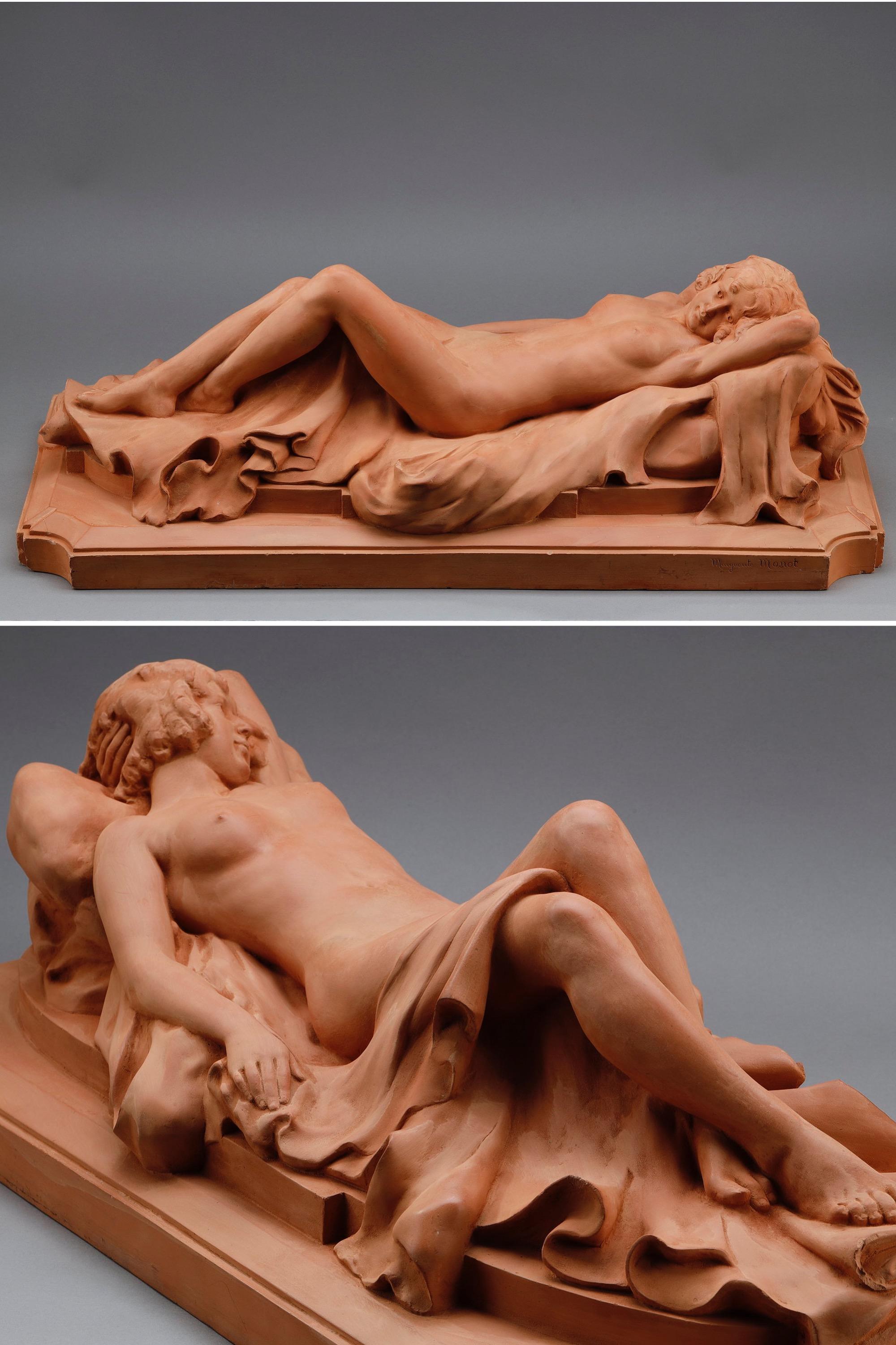 Large terracotta figure of an odalisque reclining in drapery, signed on the terrace Marguerite Monot (1903-1961). Art Deco period.