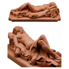 Vintage Large terracotta sculpture depicting an Odalisque reclining on a drape