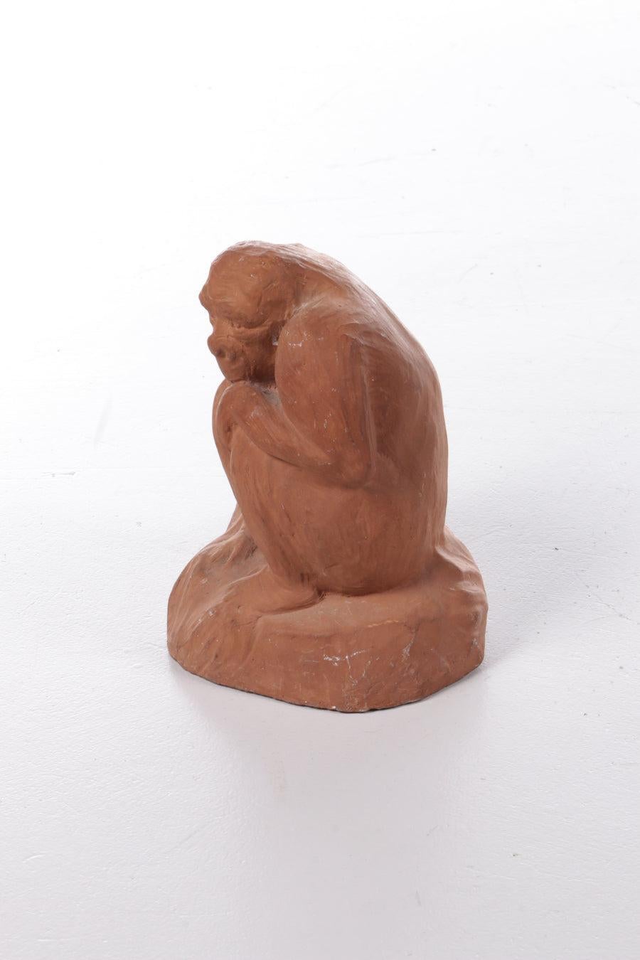 Large Terracotta Sitting Ape
Beautiful unglazed terracotta statue of a sitting monkey on its rock.

The statue is in very good condition and fits in almost any interior.

A funny addition wherever you place it.


Additional information: 
Dimensions: