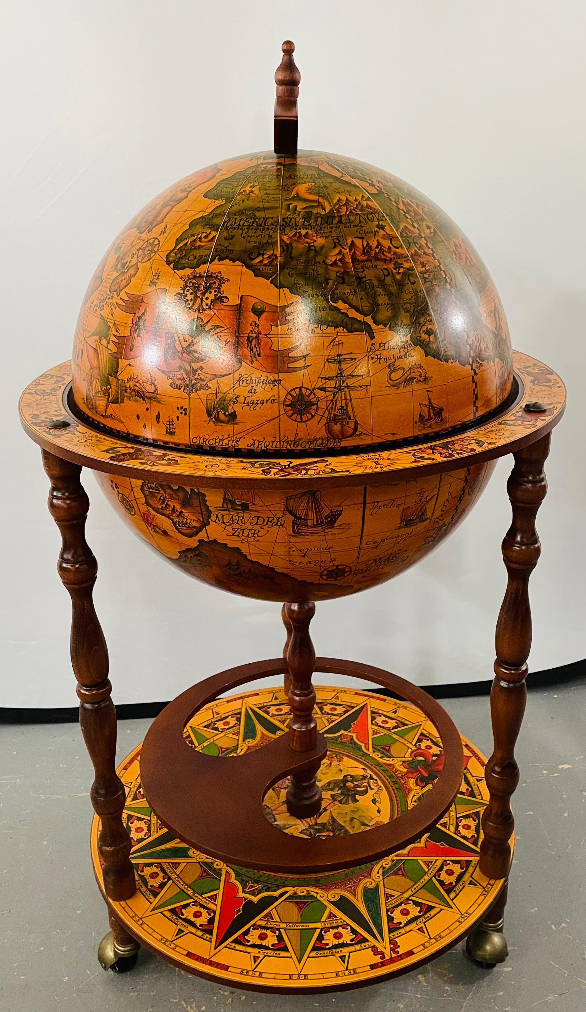 An exquisite late 20th century vintage large terrestrial and celestial globe with astrological signs displaying magnificent details made of mahogany wood and papier-mache and standing on a round zodiac platform attached to 4 wheels with brass