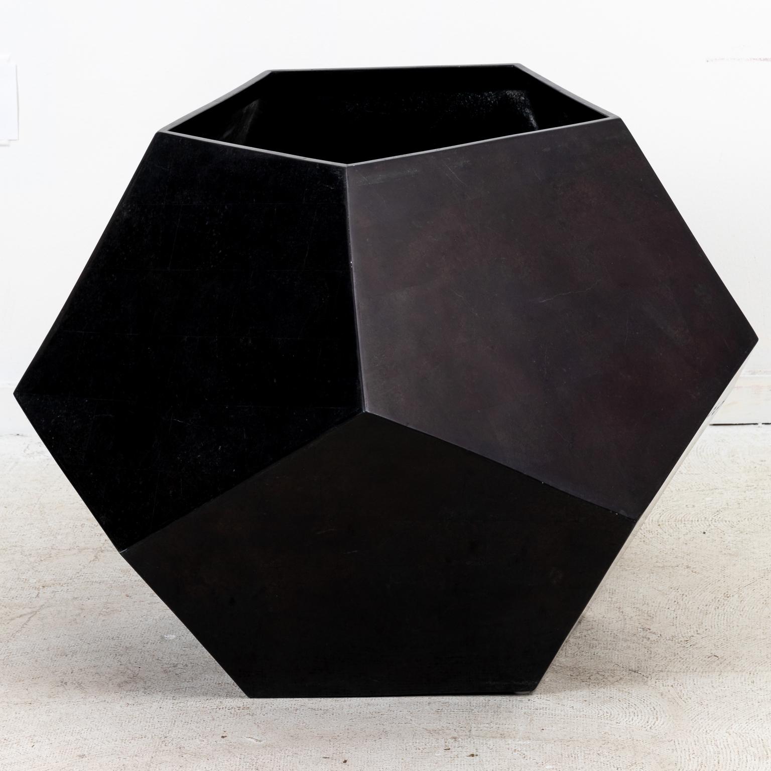 Contemporary large cubist style planter with black tessellated fossil stone veneer over fiberglass shell.