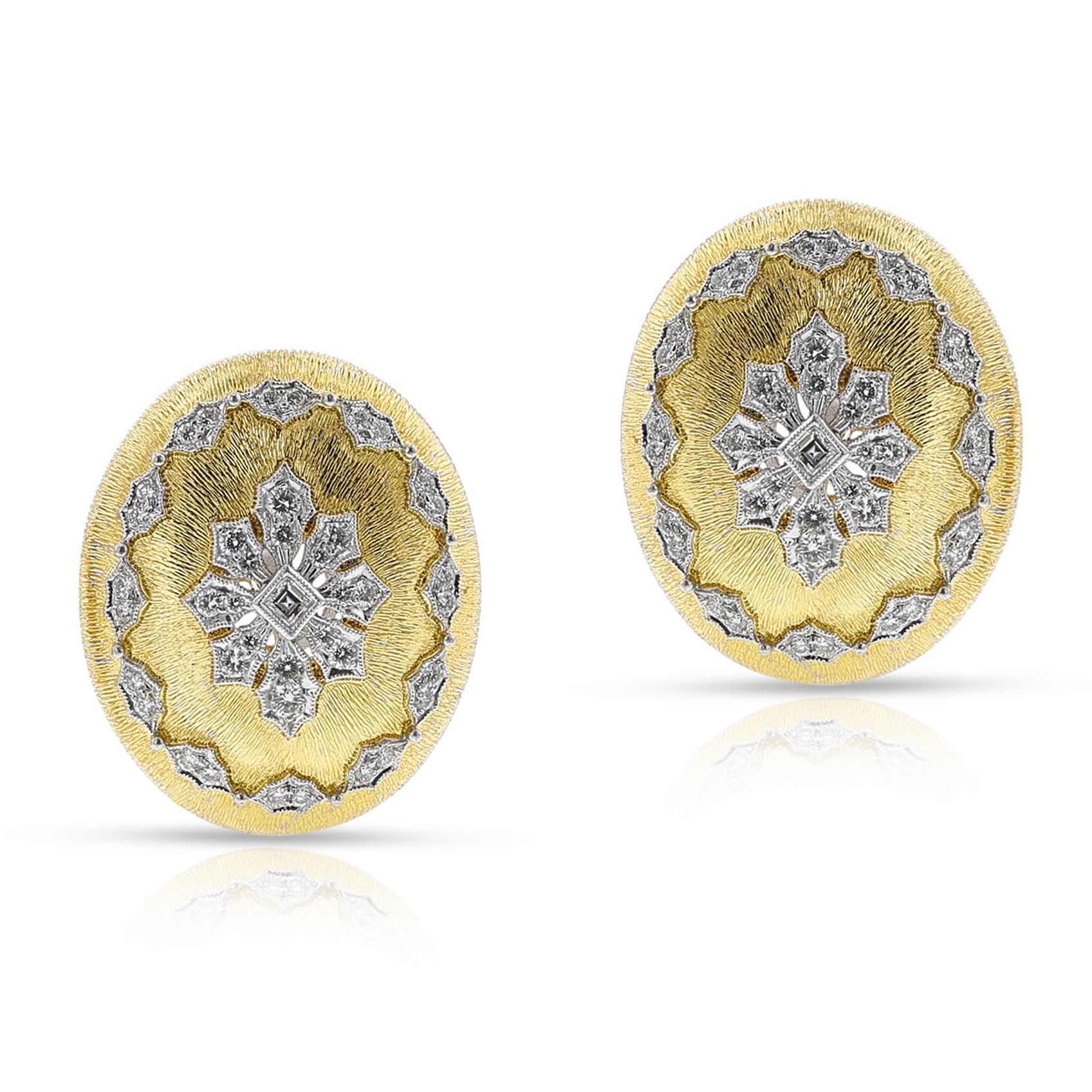 A pair of Large Textured Gold and Diamond Earrings made in 18k Yellow Gold. The diamonds weigh appx. 1.25 carats.  The total weight is 26.84 grams. The dimensions are 1.18